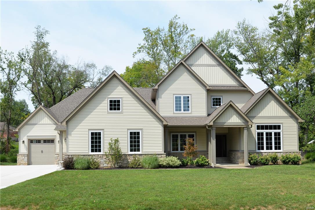 WOW!  Staged and shows beautifully!! Almost 6000 sq ft of new living space! Builder has now included 1600 sq. ft of finished space at $75,000- (builder cost) INCLUDED IN SALES PRICE!  BEST BUY IN KIRKWOOD SCHOOLS! Quality Built and Ready to go! Located sought after Harwood Hills neighborhood! Offering 6 bedrooms, 5.5 baths, 3 car garage and a beautiful covered rear patio AND NOW A FINISHED LOWER LEVEL W/ WET BAR! Main floor Master Suite & 2nd bdrm ON MAIN LEVEL for in-law Quarters or office! Fabulous Gourmet Kitchen with Custom Cabinetry galore, Granite Counters, Large island open to Breakfast & Hearth room with lots of windows overlooking back yard! Butler’s Pantry w/wine cooler! Spacious main floor laundry and mudroom! Beautiful Wood Floors on 1st floor! 10 ft ceilings on first floor, 9' 2nd floor and Lower level! Enjoy “The Lodge” at Des Peres State of the Art Rec/ Pool Complex! One Year Builder warranty included! Refrigerator Included!