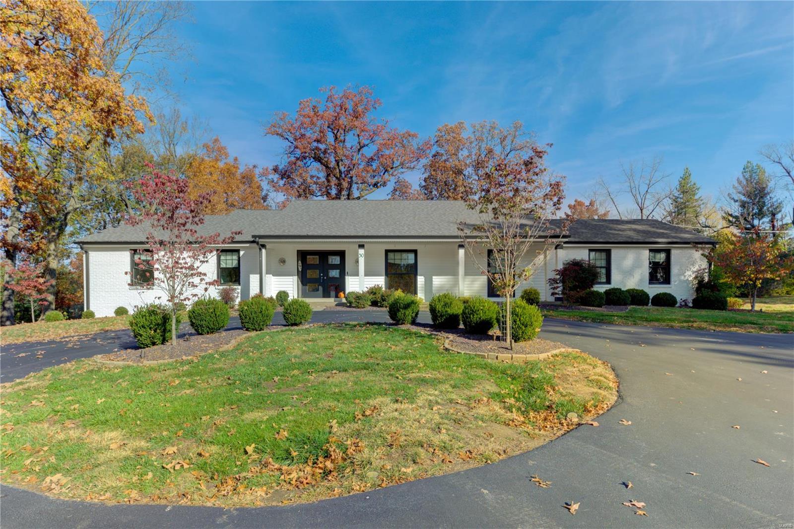 Offered below appraisal!!  2018 renovation with addition on a 1.03-acre private, wooded lot! The home features 6+ bedrooms, 4.5 baths, & 5110 SF of living space on 2 levels including 3,762 SF on the 1st floor. Two primary suites on the main level!  The 2nd with its own kitchen, LR, BD, and bath. Two distinct living areas with broad appeal for nanny, live-in relatives, or multi-generational families. Compares to new construction--you will enjoy marble countertops in the kitchen, wood floors, and Silestone or quartz countertops in all baths except the half bath, all new plumbing, light fixtures, LED lighting, custom ELFA closet systems, window treatments, zoned HVAC, roof, and windows. Don't miss the 3 skylights, new cedar privacy fence, extensive new landscaping and lighting, laundry w/ quartz sink & counter, mudroom w/ kids' area cubbies, and multiple home offices. The LL features a Rec room, bathroom, sleeping area/office, and spacious unfinished storage area and cedar closet. Additional Rooms: Mud Room, Sun Room