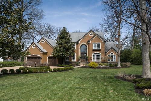 Spectacular design & handsome features in this newer custom 1.5 story home, which resides on a .6 acre lot in prestigious Sherwood Forest, make it a rare find. From the moment you arrive, you will admire the impressive wood & beveled glass front doors, & you will appreciate every fine detail of the home that makes it so special. Highlights include a 2 story foyer & great room, impeccable décor, the extraordinary millwork, the excellent floor plan, the MFLR MSTR suite w/ HUGE walk in closet, oversized open kitchen boasting the finest of finishes & appliances, MFLR laundry, the exceptionally spacious rooms and a gorgeous, professionally landscaped yard including an irrigation system and spectacular outdoor living space. This home offers 4900 SF + finished LL with BR & bath, gleaming HDWD, 10' ceilings, vaulted ceilings, THREE fireplaces, built in stereo system, 3 car garage, zoned HVAC, central vacuum, TWO water heaters, aggregate driveway.  PLEASE WATCH THE VIRTUAL TOUR!