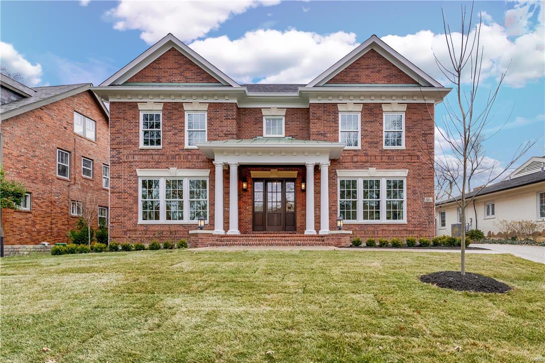 Douglas Properties is proud to be the builder of this custom home located minutes from Forest Park and in Clayton Schools. This is a rare opportunity to live in a new home in this subdivision. THIS HOME IS COMPLETED AND READY TO SELL .  This is truly a special home featuring a center hall plan and 10 ft ceilings on the entire 1st floor & an open floor plan for today's lifestyle!  Features include wood floors on entire 1st floor, Markus cabinets and Wolf / Sub Zero appliances with a mud room & 1/2 bath off the kitchen.  Top of the line fixtures, master suite that comes right out of a magazine w/ morning coffee bar and luxury bath. Each bedroom is en suite, 1,300 square feet of finish in the lower level w/wet bar, fireplace & bedroom / bath brings the finish square footage to 5,600 square feet.  There's also living space on the 2nd floor of the detached garage. You will find all the high end finishes in EVERY Douglas Properties home COOL: 14 SEER+