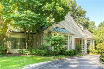 SOLD AT PREMIERE! Nestled on one of Ladue's most private lanes and cul de sac lots, this slice of the Hamptons or Cape Cod is sure to exceed even Buffy and Jasper's expectations and desires. The unrivaled floor plan centers around the most stunning hearth room/kitchen imaginable. Designed to be equal measures state of the art and comfortable. A mecca for fellowship and creativity it is the ideal spot to admire the gardens outside whilst making dinner and sharing drinks with all your friends and family! Stunning formal rooms offer boxed bays, intricate mouldings, hardwoods, fireplace and direct access to a four season's room with three sides windows and stove. The ideal spot for watching the snow fall or birds gather in the oversized side yard. First floor master offers incredible bath and direct access to season's room. 2nd floor master has direct access to terrace. 3rd and 4th beds share hall bath. Lower level has fireplace and newer 1/2 bath. Incredible mudroom/pet's paradise! Additional Rooms: Mud Room, Sun Room