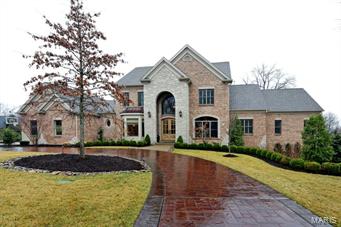 5 Year new Berkley built built home on a private gated street in Ladue schools with outdoor entertaining like you've never seen.  Center stage is the covered lanai w/fireplace overlooking gorgeous pool and professionally landscaped yard. From there step down to the spa or cross the bridge to the pool slide. To the left, a gazebo with BBQ grill, refrigerator and LCD TV.  The 6 Bedroom, 9 bath home offers a great rm, formal dining, butlers pantry, office, state of the art kitchen open to vaulted hearth room with stone fireplace, master suite w/ his/her walk in closets, dressing area w/ built ins and refrigerator, luxury marble bath with dual entry shower, dual vanities and heated floors. A 2nd bedroom suite/nursery & laundry complete the 1st flr. Upstairs; 3 bedroom suites, bonus room & 2nd flr laundry.  Fabulous LL w/ astroturf & padded batting cage, exercise rm, play room, designer bar/kitchen, rec room w/stone fireplace, 6th bedroom suite & bath w/steam room & access to pool.