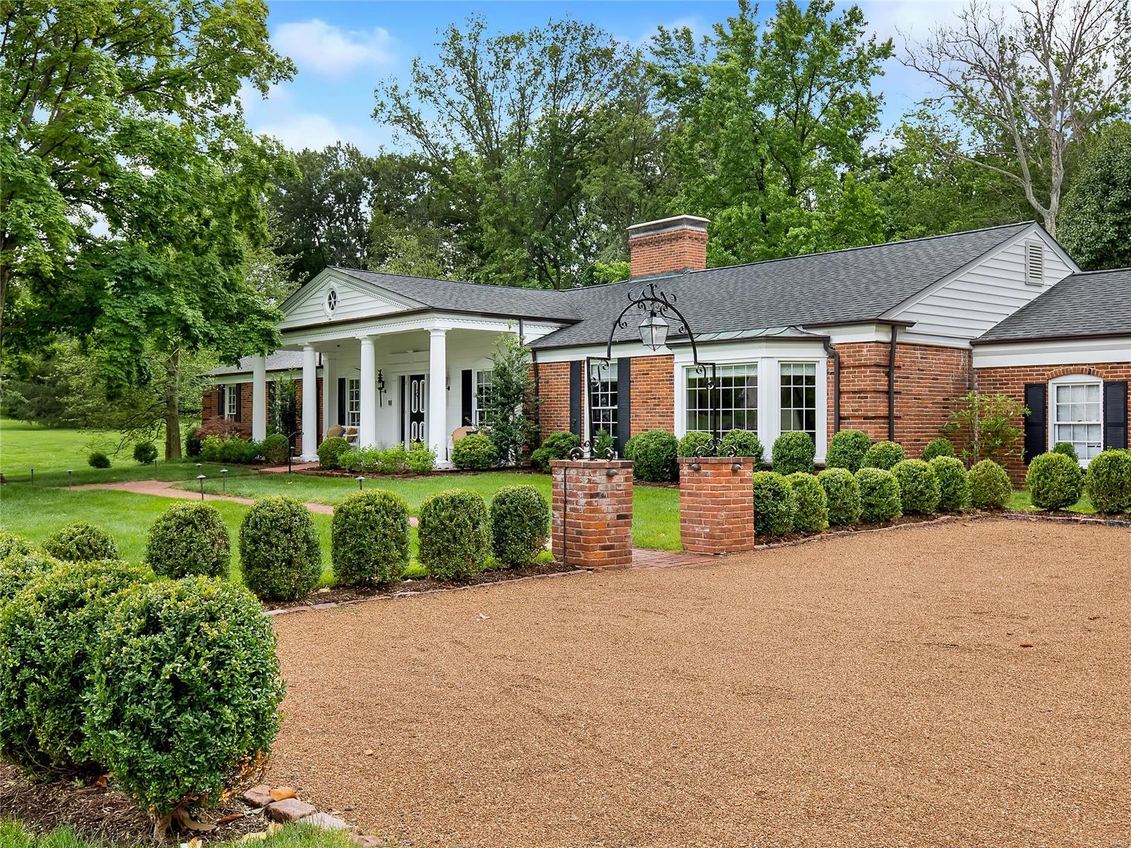 Luxury one level living perfectly situated on a 1.8 acre lot on Trent Drive within a sand wedge of Number 10 green at Old Warson Country Club. This 3 bedroom 4.5 bath home with 3 car garage and pea gravel driveway has sweeping views of the back 9 from the formal living room and porch featuring a wood burning fireplace adorned with an Italian marble mantle and formal dining room with large bay window that floods the room with natural light. The heart of the home is a spacious great room with a 12 foot ceiling, built in book shelves, wood burning fireplace, wet bar and floor to ceiling windows. A French door leads out onto the beautiful covered and heated brick patio. Enjoy your summer nights relaxing with your family in this gracious outdoor living space. The lower level has been completely renovated and finished featuring a large recreation room, exercise room, full bathroom and office. Updates galore and fresh paint throughout! This location is luxury living at its finest!