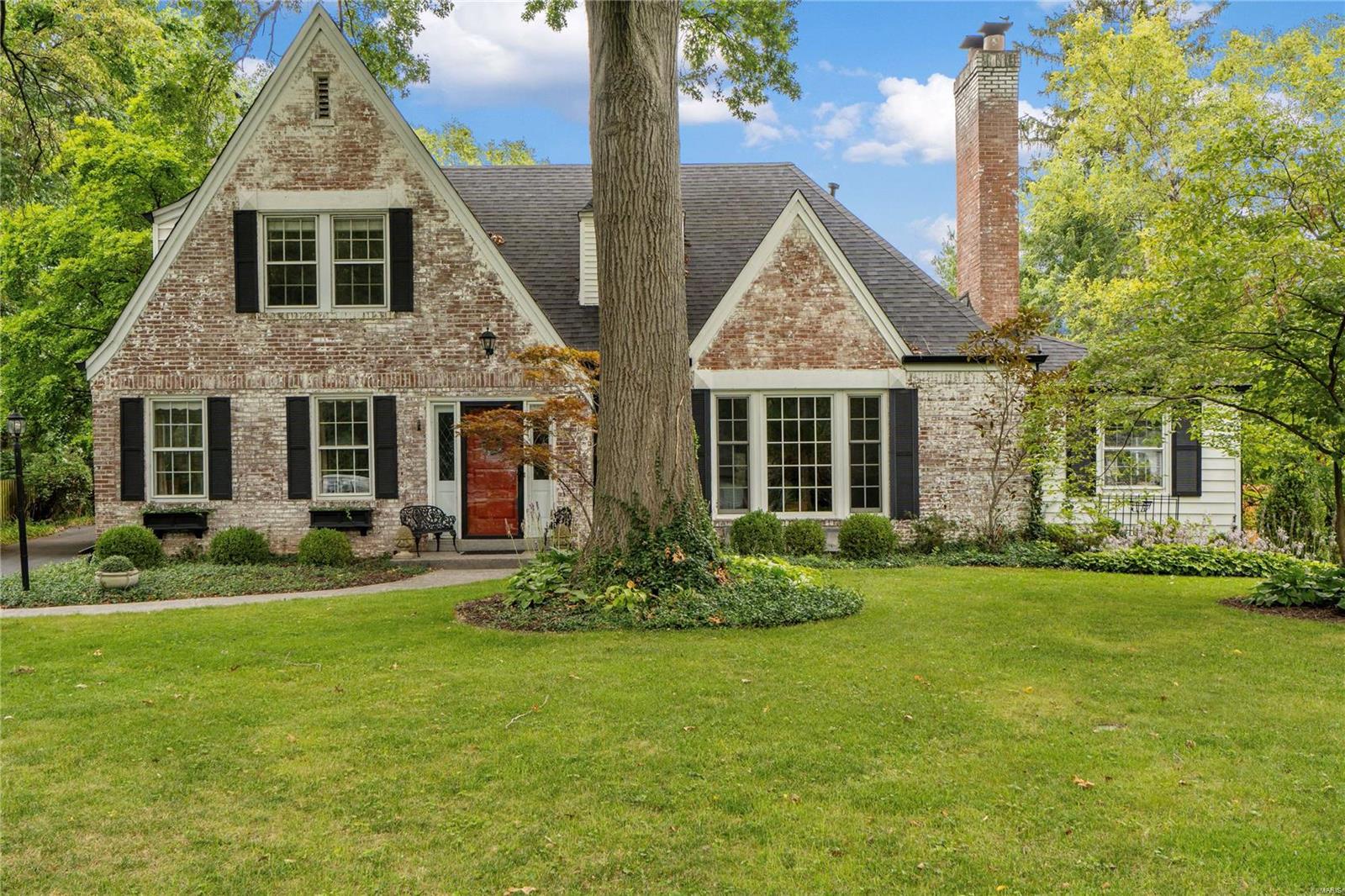 Step into this picturesque white washed brick home located in the sought-after Willow Hill Neighborhood. Situated just moments from downtown Clayton, this Ladue residence offers seamless access to major highways, stunning parks and the renowned Reed Elementary School. Boasting 4+ bedrooms (main floor Family Room could serve as 5th bdrm if desired,) and 3 updated full bathrooms, this home showcases elegant hardwood floors, build in bookcases, gas fireplace, bright windows, a modern eat-in kitchen with a central island, and a seamless flow to the private patio and pool area. You will FALL IN LOVE with the screened in porch overlooking the pool! The detached two-car garage, lush mature trees, and refined landscaping create a serene outdoor oasis, while the finished basement with walkout access provides added versatility. Move right in and host all your favorite people!