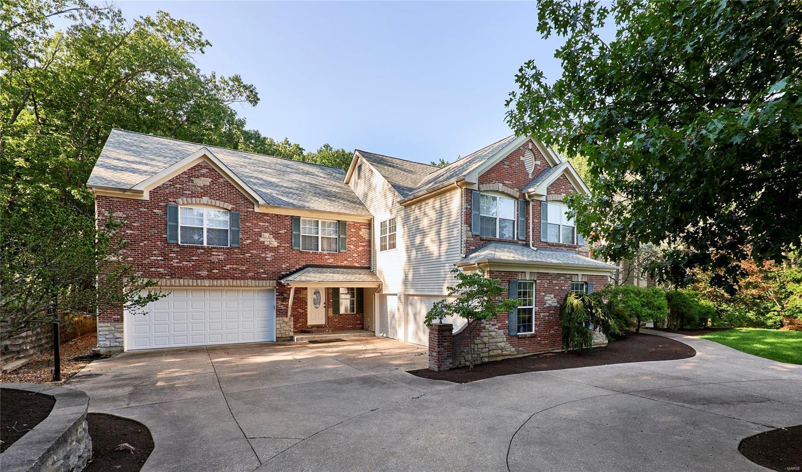 Introducing a one-of-a-kind 9Bed, 7Bath Home! Boasting a generous 6,344 square feet of living space. You'll be greeted by a circle driveway leading to a 5-car garage, setting the stage for what lies beyond. Notice the spaciousness of this exceptional home. The kitchen, complete with an abundance of cabinetry and a center island, equipped with updated appliances, this kitchen is a chef's dream. A walk-in pantry adds practicality to this gourmet space. With a laundry room located on the main floor and an additional laundry room attached to the master suite, convenience is no issue! The Master Bedroom complete with a wet bar and space for an office, makes it a perfect retreat within your own home. Outdoor living is a true delight, as this property sits atop 5 acres surrounded by woods, offering serenity and privacy. Welcome to your personal paradise.