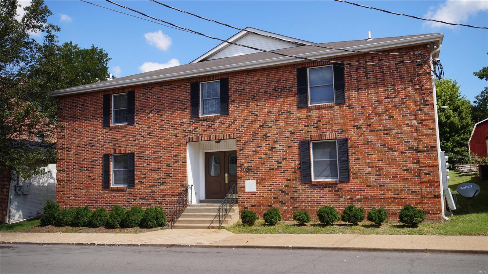 Located in historic Old Town Florissant with shopping, dining located in historic buildings. On Rue St. Francois there are annual events and festivals including the Valley of Flowers Festival, Fall Festival and Wednesday night out parties. Florissant has been previously ranked as the #1 best small city to retire in and #2 safest in Missouri. Complex built in 1986. Easy to maintain solid all electric brick building with pitched roof, built on a slab. All apartments have central heat and air conditioning and updated electric. Rents can be raised considerably as is and additionally with minor cosmetic upgrades. Two apartments for rent just rented for $775 in 2 days, the last apartment for rent will be marketed at $800. Units have washer/dryer hookups in all units and vinyl windows. Building is a 55+ senior building with many long term tenants. There is shared parking next door in the rear. Located next to a restaurant with seating adjacent to the building. Seller is encouraging offers.