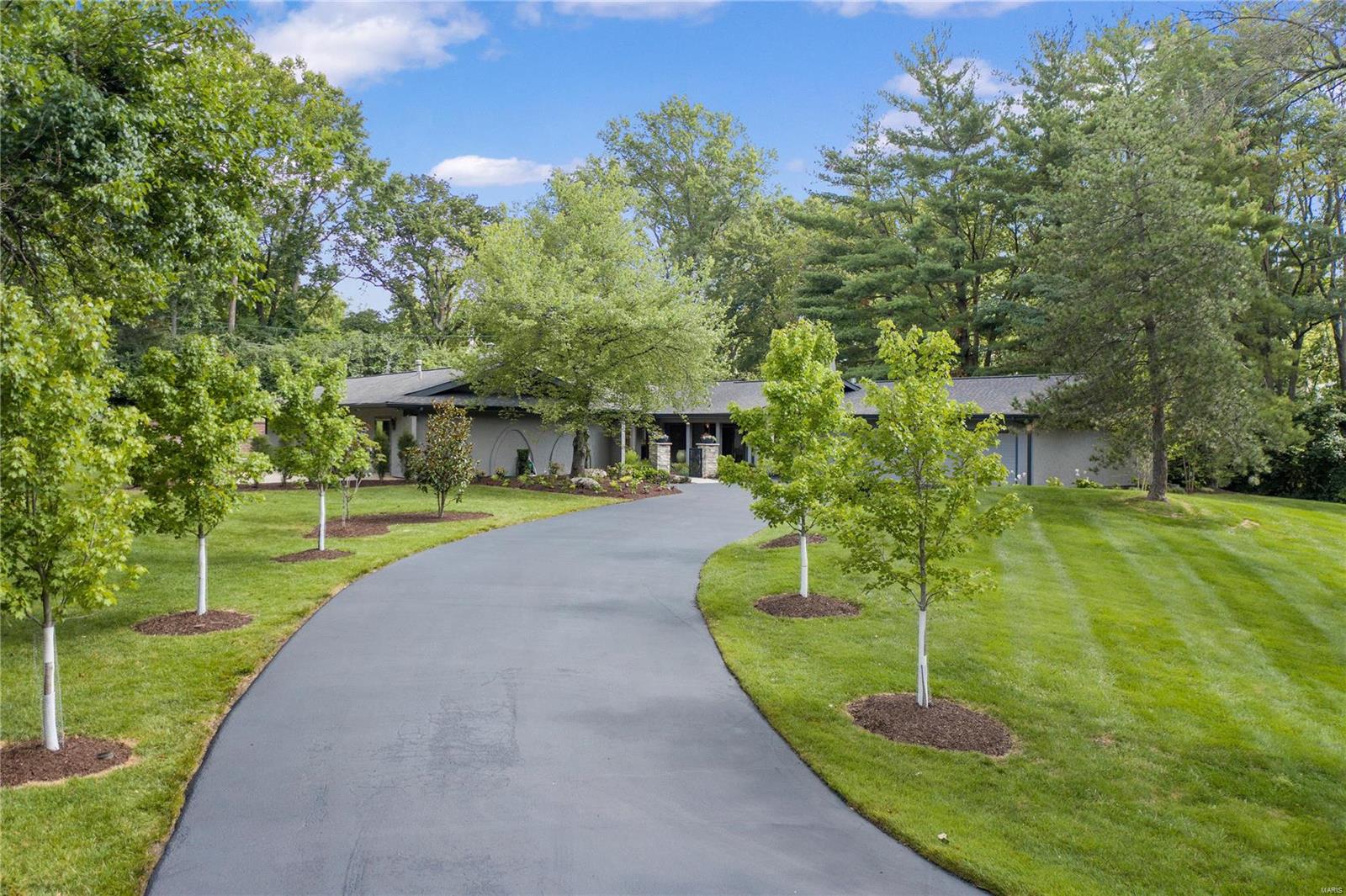 Stylish sophistication is achieved in this beautifully renovated 3 Bdr, 3.5 Bath home with over 4,000sq/ft of living space on 1.4 acres in desirable Westwood Country Club. This stunning home has been completely remodeled & features, vaulted ceilings,generous size rooms & high end finishes, As you enter the home through the front courtyard with fountain, be prepared to be wowed by the dramatic Family Room with soaring ceiling, built-in bookshelves, fireplace, bar & door opening to the patio & waterfall. The newer chef's kitchen boasts custom cabinets, center island, quartz counters, a walk-in pantry & stainless appliances. Living Room with fireplace, separate Dining Room, Powder Room with custom countertop. Large Master Bedroom suite with vaulted ceiling, large walk-in closet and sliding doors to back patio. Spa-like Master Bath, separate vanities, free standing tub and shower. There are 2 additional Bedrooms each with a full Bath. Three car garage with plenty of storage. This is a gem!