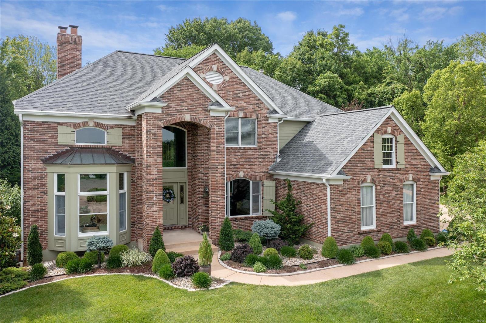 INCREDIBLE PRICE IMPROVEMENT. Fabulous updated home with BONUS Buildable Lot (.39 acres) in Kirkwood School District. Located on a Quiet cul-de-sac. Fall in love with this Stunning Setting; Lush landscaped yard, spectacular pool, outdoor kitchen, covered fireplace, & adjoining pool house with HVAC. Bright 2-story foyer welcomes you to a spacious floor plan; Living Rm boasts soaring ceilings & large fireplace, sophisticated paneled family rm with stunning millwork & built-ins, & convenient office. Kitchen feat. custom cabinetry, center island, & breakfast room with floor to ceiling windows overlooking the pool & waterfall. Large laundry room & 3-car Oversized Garage. Upper level offers Large Primary Suite with coffered ceilings, fireplace, 2 walk-in closets & large spa like bath with shower & whirlpool tub. 3 additional bedrooms/2 full bths (1 ensuite, & 1 Jack & Jill). This home is impeccably maintained & offers all the bells & whistles, move right in & enjoy the outdoor living!