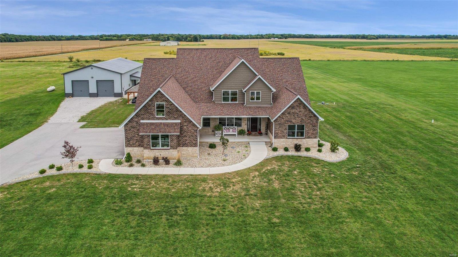 Luxury Living in the Country on 3 acres!  Thoughtfully customized built home has 6 Bedrooms, 5 Bathrooms & over 5700 sq ft of finished living space!  Open floor plan with over 10 ft. ceilings, custom built-ins, 2 fireplaces, screened-in porch, covered patio, large patio connected to in-ground pool, hot tub, & portico with fire pit.  Near the house is a finished, heated, 40x64 recreational barn with (2) 12-foot garage doors, openers & a side garage door for easy access to outside entertaining.  Home has solar panels, security lights, underground dog fence, & extremely well documented & detailed records of all systems. Additional Rooms: Mud Room COOL: 14 SEER+