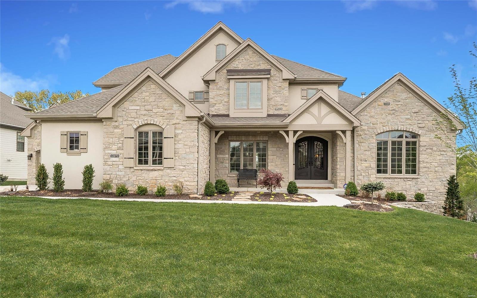 Gorgeous 1.5 Story w/all the finishes & upgrades at this newer McKelvey-built home sitting on premium cul-de-sac lot in excellent location.5 bedrooms,4.5 bathrooms & almost 6,000sqft of living space in sought-after Arbors.Wrought-iron entry doors & hardwoods greet at foyer through dining room & great room that feature soaring vaulted/beamed ceilings,stone fireplace flanked by built-in shelving.Dual French doors lead to covered composite porch & stone fireplace w/great views.Designer kitchen offers staggered cabinetry & crowd-gathering island,Dacor appliances,6-burner gas range,custom backsplash,white granite,Bosch drawer dishwasher & pantry w/built-ins.All open to breakfast & hearth room w/stone fireplace,built-in shelving & remote blinds.Luxury main floor master suite w/coffered ceiling & moldings,spa-like bath w/huge walk-in body spray shower & custom closet.Wide spindled stairwell leads to loft,3 large bedrooms,jack-n-jill & full baths.5th bed,theatre,rec & family room W/O to patio. COOL: 14 SEER+