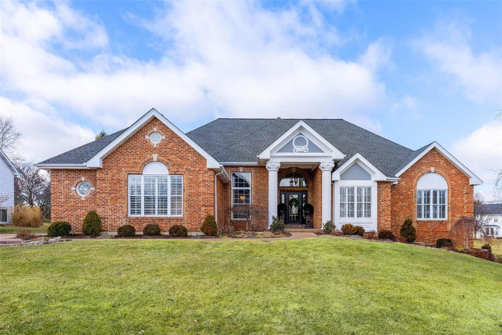 Beautifully designed 5030 sf brick & stone atrium ranch in prestigious Whitmoor Country Club. Impressive entry foyer with 12’ ceiling leads to elegant dining room & stunning great room with box beam ceiling, marble fireplace & 2-sty dimensional windows. Designer kitchen with 42” glazed white cabinetry, quartz countertops, premium appliances, butterfly center island & butler’s pantry adjoins breakfast room with groin vault ceiling & palladian windows. Coffered primary bedroom suite with wide bay window & luxury bath with freestanding tub plus 2 additional bedrooms with Jack n’ Jill bath complete the main floor living quarters. Lower Level includes recreation room with floor-to-ceiling brick fireplace, media room, game room with wet bar, office, 4th & 5th bedrooms with Jack n’ Jill bath & ½ bath. Atrium doors open to multi-level deck that overlooks the 3rd hole on the North course. Golf community lifestyle with access to clubhouse, pool, tennis courts & 36-hole championship golf course.