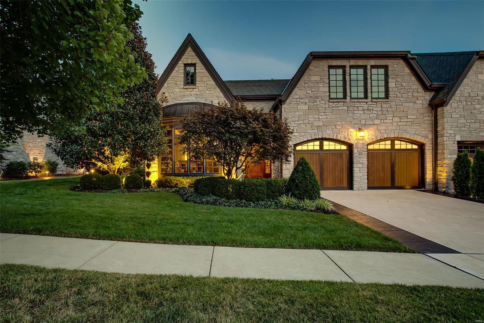 Stunning custom villa in sought after gated community is an unexpected combination of classical English stone exterior coupled with the dramatic timeless elegance of an interior modern architectural aesthetic, functional beauty and sophistication. Expansive spaces are anchored by gorgeous millwork and elevated with arched doorways and high-end hardware; complementing 10 & 15ft. ceilings throughout this tasteful lock and leave villa. From the gourmet kitchen with Sub-Zero 100 bottle wine cooler to the refined patio areas, this home is perfectly suited for the individual or couple who enjoy entertaining and modern contemporary living. The sophisticated simplicity and strikingly fresh style continues into the elegant master suite and stunning 350k master bath/dressing area renovation. The lower level offers two additional bedrooms, bath, family room w/second fireplace, French doors open to covered patio. The grandeur continues in the outdoor spaces with serene views and clean landscapes. Location: End Unit, Ground Level