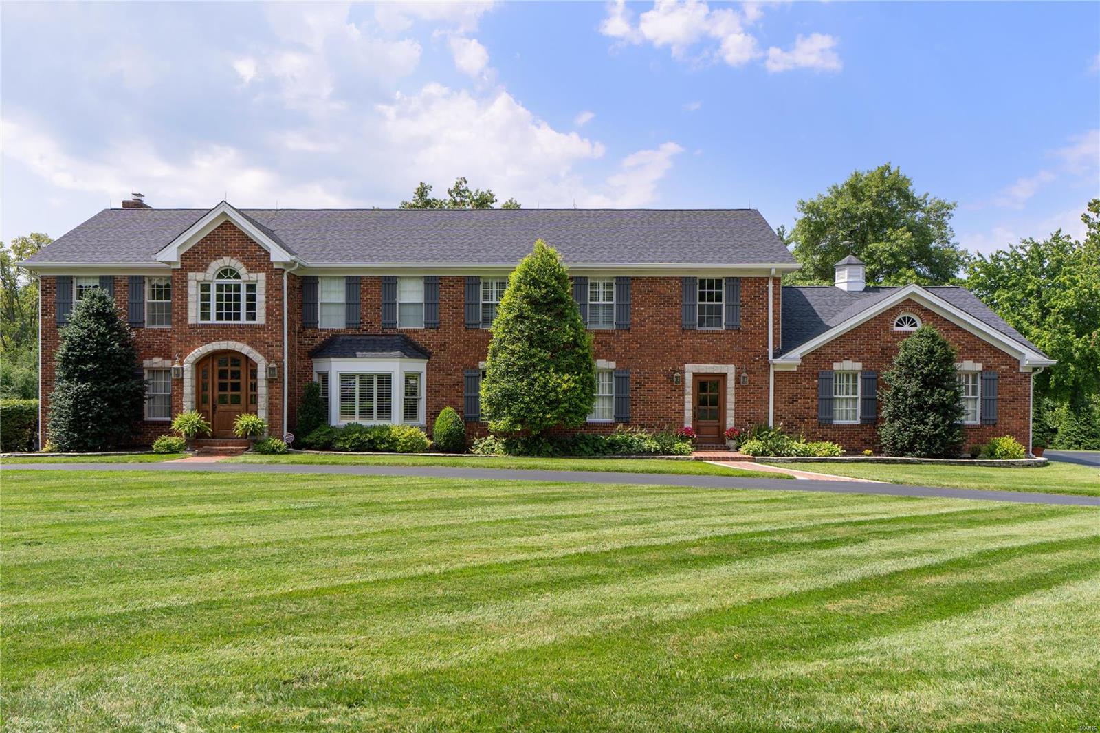 Beautiful Family Home located on desirable cul de sac in Des Peres. Almost an acre lot with gorgeous pool and plenty of green space for play.  This home has been lovingly maintained and added on to by original owners.   Center hall plan with plenty of generous rooms for entertaining and living.  Updated Off white kitchen cabinets with high end appliances and lovely 3 season porch w/ fireplace.  The spacious Great Room addition flows well as a pool house with a pool bath for easy access.  Bar area features beautiful counters, sink and ice maker ideal for entertaining.  Serene pool area w/ beautiful stacked stone & slide.  Upstairs boasts 6 bedrooms &  3 full baths,  The 6th bedroom is perfect for an office or an extension of the primary suite closet.  Finished LL with plenty of storage & a half bath. 3 car attached garage.  This location is popular due to proximity to schools, churches, Des Peres Park & shopping.  Dont miss this opportunity to make this home your families forever Home. Additional Rooms: Sun Room