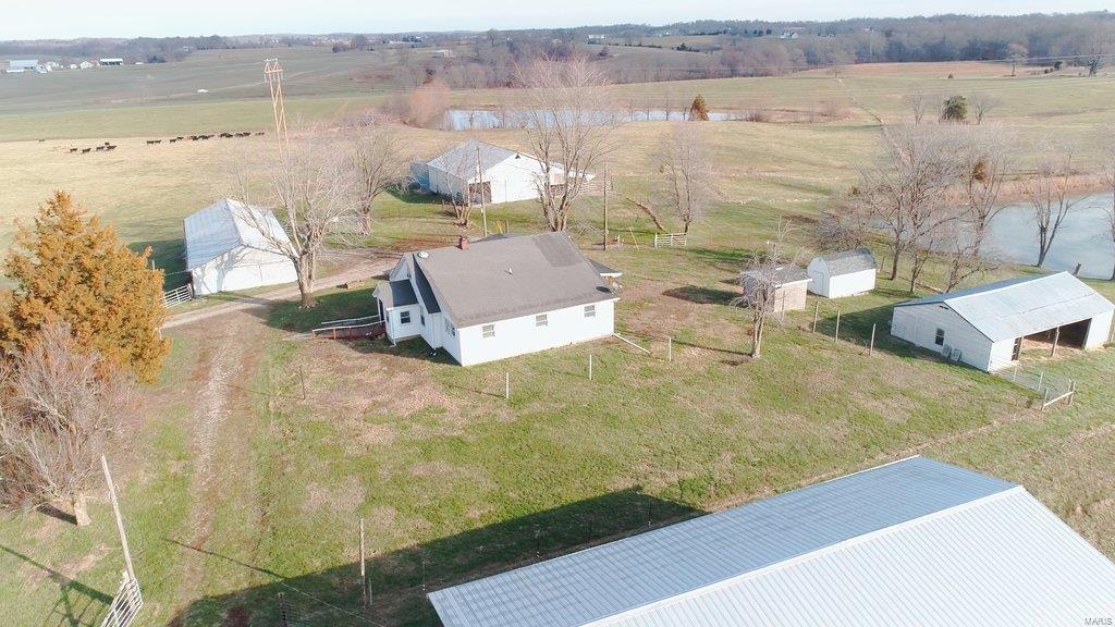 Welcome to 485 State Highway F Jackson, MO 63755!LOCATION, LOCATION,LOCATION This property is to be sold at AUCTION! The AUCTION is to be held JANUARY 26th 2023 @ 10:00am @ JACKSON CIVIC CENTER 381 W. DEERWOOD DR JACKSON,MO 63755. There will be a PUBLIC OPEN HOUSE ON 1-14-23  FROM 11:00AM TO 1:00PM THERE WILL BE A SIDE BY SIDE ON SITE SHOULD YOU WANT TO VIEW THE PROPERTY. This 102+/- acre farm is being split  into 3 tracts it offers fencing & cross fencing current use has been for cattle . This farm is ABSOLUTELY BEAUTIFUL w/ it's gently rolling pastures & is only 4.5 miles outside of town there's  3 ponds one of which is 3+/- acres Lake Doris which is stocked w/ bass, bluegill & catfish there are several structures barns, sheds, workshop, covered storage for round bails. There is also a 1743 +/- sq ft 3 bedroom , 2 bath 1.5 story home w/ a basement for extra storage. Don't miss out on this farm! Terms:5% buyers premium will be added to the final price. All terms at harrisauctions.com