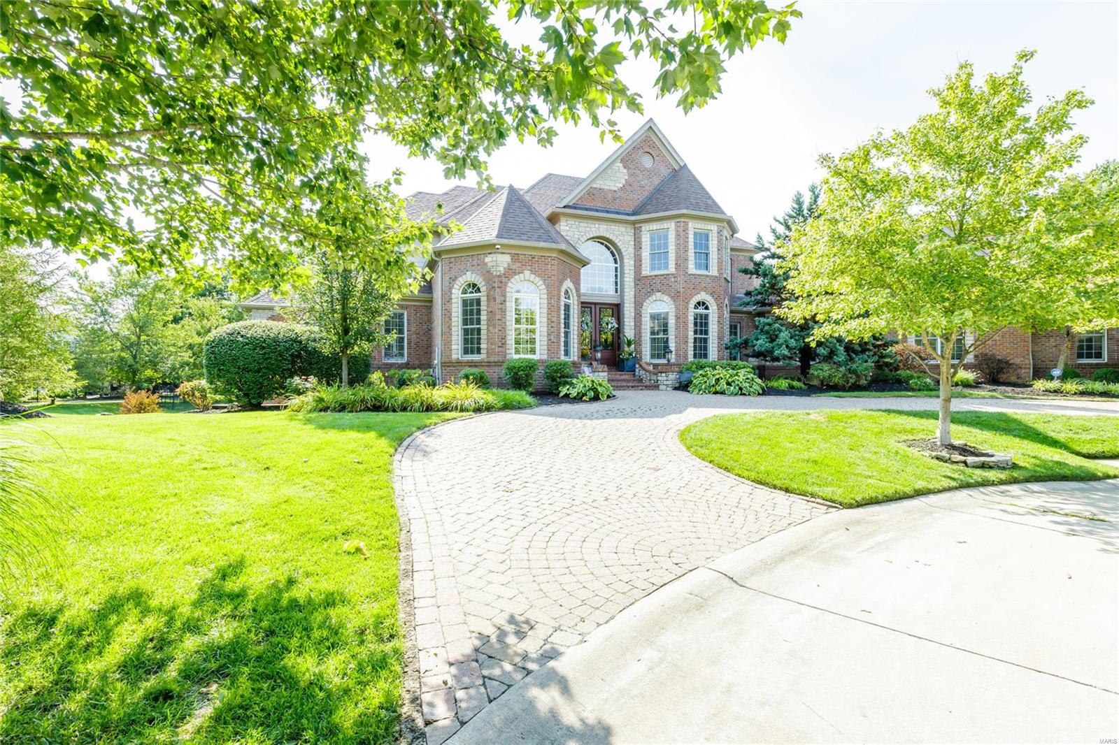 Open 8/29 cancelled due to offer accepted.Since purchasing, the list of improvements are endless, including 2 additions that make this home now 7,516 SF w/ 5 bed, 4 full/2 half baths on a prime, level, hard to find, 1 acre lot w/ a gorgeous in-ground pool, sports court, & putting green. Main floor master, 3 beds up & a 5th bed in LL. Stunning 2 sty GR w/ impressive wall of windows overlooking the gorgeous pool/trees. Gourmet kitchen w/ gas stove, island, large breakfast room that flows into the cozy hearth room as well as into the upper covered deck area that you’ll never want to leave. The master suite’s multiple closets & walk-in that's a room in itself will knock your socks off. The lower level is updated with high end stone work & rustic charm, with a wet bar, living room, theatre room, game room, wine cellar, bedroom, full bath & still plenty of storage. There is so much more to tell you but out of characters so we uploaded a list of features to the MLS. Let us know if you need it