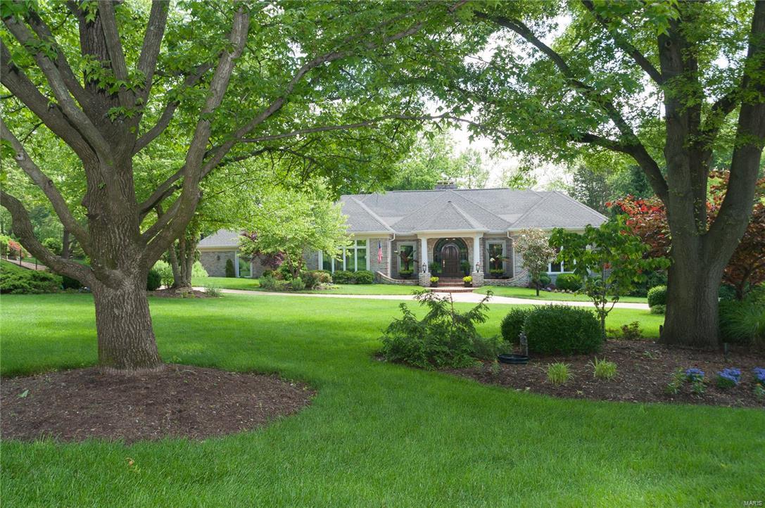 Distinguished in excellence ! 1-1/2 Story Town & Co home.Complete renovations additions have been done to this home. Sold Mahogany Front door, professionally landscaped home with inground sprinkler system.  Circle Drive, & 3 car garage (side entry). Den/Office finished in solid Cherry. inspiring Kitchen with Custom Maple Cabinets features include Fisher Dishwasher, Sub-Zero refrigerator and Drawer, Kohler custom Artist Series Sinks,Decor Stove, Gas cook top.Glass Tile back splash.  Prep Sink/Bar Sink, Separate Ice maker, Warming Drawer, Expansive Island & granite counter tops. Adjoining Eating area, opens to extraordinary Hearth Room with Gas fpl.  Great Rm with 18ft vaulted ceiling centered by gas fireplace. Master Br with expansive closet, full bath with Double Tall Sinks. Jacuzzi Tub Separate Shower, Heated Floors, makeup area.Two br upper level.Full in-law quarters in lower level.Waterfall, pond, & custom pool adorn the back yard.  Pool is heated with picturesque Landscaping Additional Rooms: Mud Room