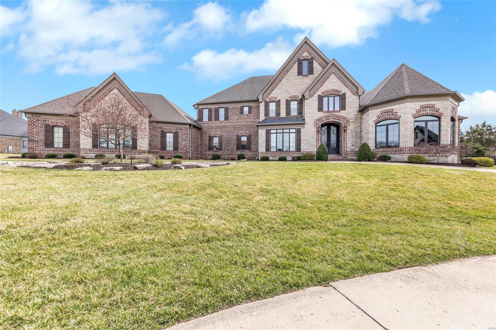 Exceptional estate in the gated enclave of Lafayette Crossing is introduced by a grand circular drive and distinguished curb appeal. 1.5 story residence includes 5 bedrooms, 6 full/1 half baths and over 8,100 square feet of luxurious living. Grand foyer leads into the home, flanked by formal dining and study. Great room features a see-through fireplace that flows into the light filled two story hearth room, adorned by bespoke built-ins. Open concept layout extends into a gourmet kitchen, equipped with an oversized island, custom cabinets, high-end appliances and adjacent breakfast room. Welcoming main floor primary suite with elegant ensuite bath and dual walk-ins. Upstairs find 4 generous bedrooms and 3 full baths. Lower level is designed for entertaining - family room, media room, wet bar, rec. room, bonus room and home gym. Outside presents a tranquil retreat: custom pool and covered outdoor living, nestled on a private, 3 acre culdesac lot. 4 car garage, extensive upgrades list. Additional Rooms: Mud Room