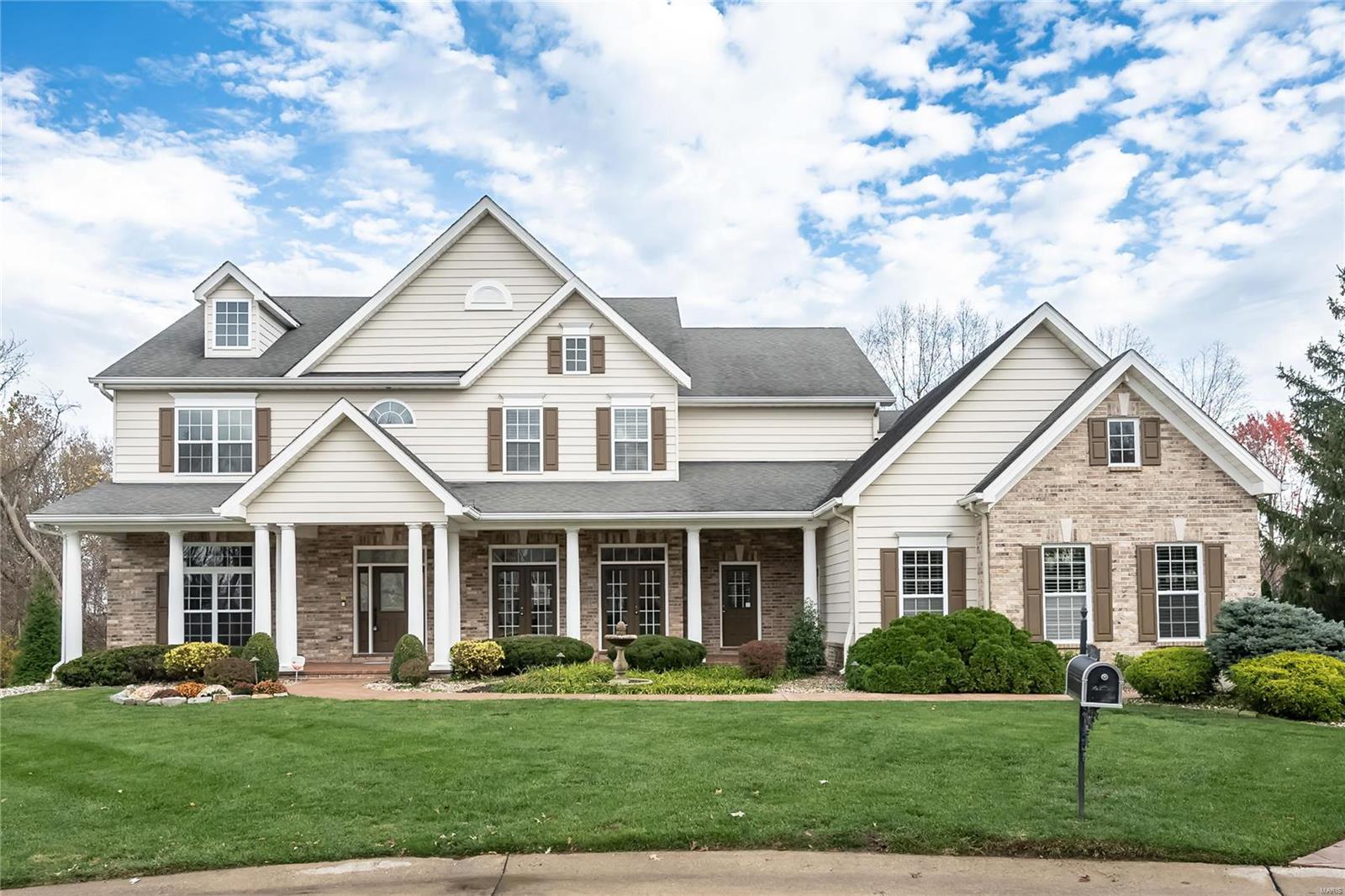 Welcome to this stately two-story home nested on a cul-de-sac & backing to a park like setting with mature trees.  The large front covered porch adds to the charm of the exquisite elevation of the home. Entering the home, you will find a warm entry that flows to a  office/study with wood accents floor to ceiling. The natural light that filters through the dining room will be the perfect place for hosting.  The stylish butler pantry/wet bar is perfect for entertaining. Kitchen boasts of 42" cabinets, center island, hearth room/breakfast room w/gas fireplace that can be opened to the large screened in porch.  Step outside to the sprawling deck that stretches across the back of the home and walks down to the beautiful in-ground pool salt water.   The LL is perfect with a theater room & then snuggle around the fireplace w/full wet bar for your pleasure with walkout to the pool.  Seller has contracted to have new roof put on the home.  Bring us an offer to reflect your desired updates. Additional Rooms: Mud Room