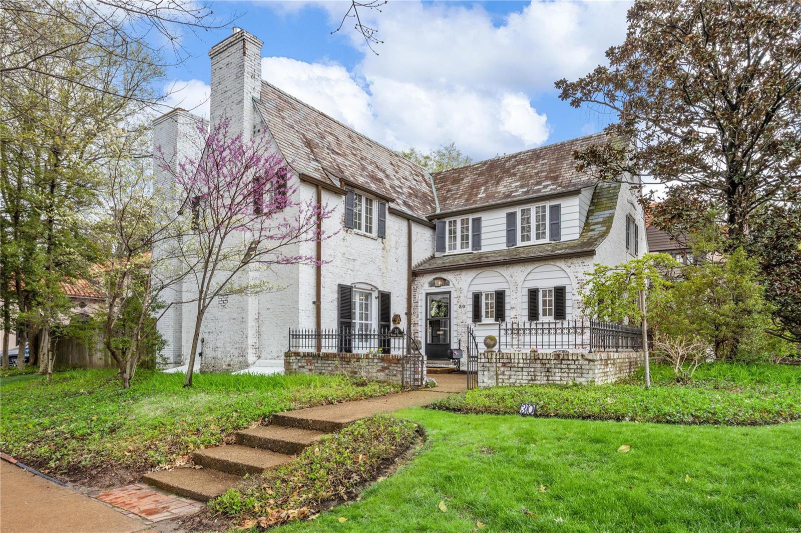This handsome home is loaded w personality. Built in 1925 there are wonderful old world architectural details combined w many great updates & additions. The 7 year old chef’s kitchen was moved into an addition & opened to large living space to create the open kit-fam rm w/ new gas fireplc that everyone wants for today’s living. Amazing island has prep sink & breakfast bar. Lots of granite counter spc & farm sink looks out 3 windows to beautiful, fenced yard. Monogram SS appliances & SubZero refrig. Dutch door leads fr/ kitchen to lovely screen porch. Main flr office can be closed off if desired. The den/library/game rm is flexible. Main flr bonus rm w French doors to stamped concrete patio is adjacent to half bath w laundry hookups. Front & back stairs. Scraped wood engineered flrs & hardwood. Upstairs 4 bedrooms incl spacious master ste w large vaulted bath featuring BainUltra air tub. Walk-in closet. One BR could be used as 2nd floor fam rm. Lots of closets. 2 car side entry garage!
