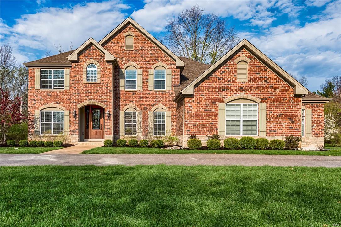 Like new, eight year old custom built Berkley home situated on beautiful level large lot in great Creve Coeur neighborhood.  Well appointed, with formal dining room, office and two story light filled great room, which flows into exquisite kitchen and hearth room.  Luxurious first floor master suite and bath will not disappoint!  Lovely staircase leads to spacious second floor open sitting room in addition to the three bedrooms and two baths.   Not to be missed finished lower level with sophisticated theater and sound system, several large entertaining areas, bar/kitchen bedroom and outstanding bath.  Don’t miss out on this exclusive property in great close in location.  Perfect condition!