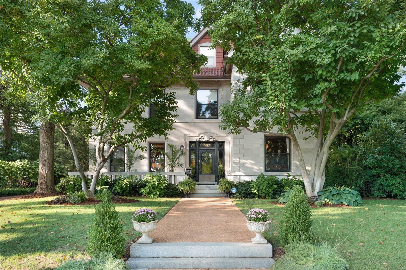 Stately manse built in 1913 in the CWE, close to BJC Med. complex, near Forest Park & just 3 blocks to everything Euclid Ave. has to offer their residents. This gracious home features an elegant marble vestibule, classic center hall flr plan, new wood floors on 1st. Significant millwork, crown molding, pocket doors, beamed ceiling thru-out the home. Kitchen has been updated w/ Denby marble counter tops, island w/ seating for 4, w/ SS appliances, 5-burner range, butler's pantry + adjacent informal dining room for everyday living/working/eating etc. + powder room completes 1st flr. Elegant split staircase leads to 2nd floor w/ primary suite featuring a FABULOUS ensuite bath w/ 2 vanities, walk-in shower w/ 2 rainheads+ spacious dressing rm. 3 add'l bdrms, a full bath complete 2nd Flr.  3rd flr. boast an add'l rec. room/studio w/ skylight + 2 bdrms, 1 bath + finished LL.  Backyard is a tropical oasis w/ pool & ample entertaining space. 3 car garage w/ charging station Additional Rooms: Mud Room