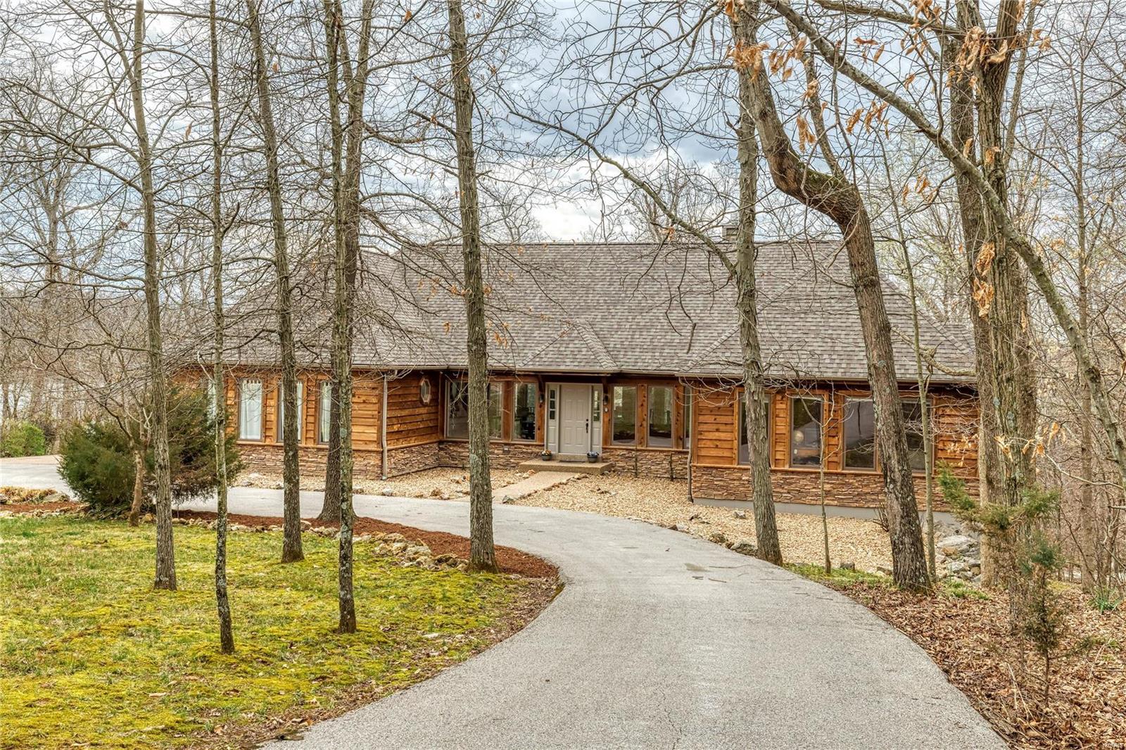 A very rare opportunity to own a turn-key, furnished home on beautiful Lake Aspen, just inside the gate and walking distance to the Aspen Center for events, coffee and more. This large, beautiful home has plenty of bedrooms and living space, an eat-in kitchen, main floor master suite & second bedroom plus a fully finished lower level with 3 more bedrooms and a large recreation room. The lot includes lake access with room for a beach and dock. Just minutes to the clubhouse/golf course and the pool at Charrette Commons, this home could not be more perfectly located for ease in and out of the resort and access to all amenities. For an extremely unique purchase opportunity, 594 Aspen Sail next door is also available from the same seller (see MLS listing #21007271). Both homes can be be full-time or part-time residences or rental homes. Build your personal or business compound at Innsbrook Resort with this unbelievable opportunity to own one or two side-by-side luxury homes! Additional Rooms: Sun Room