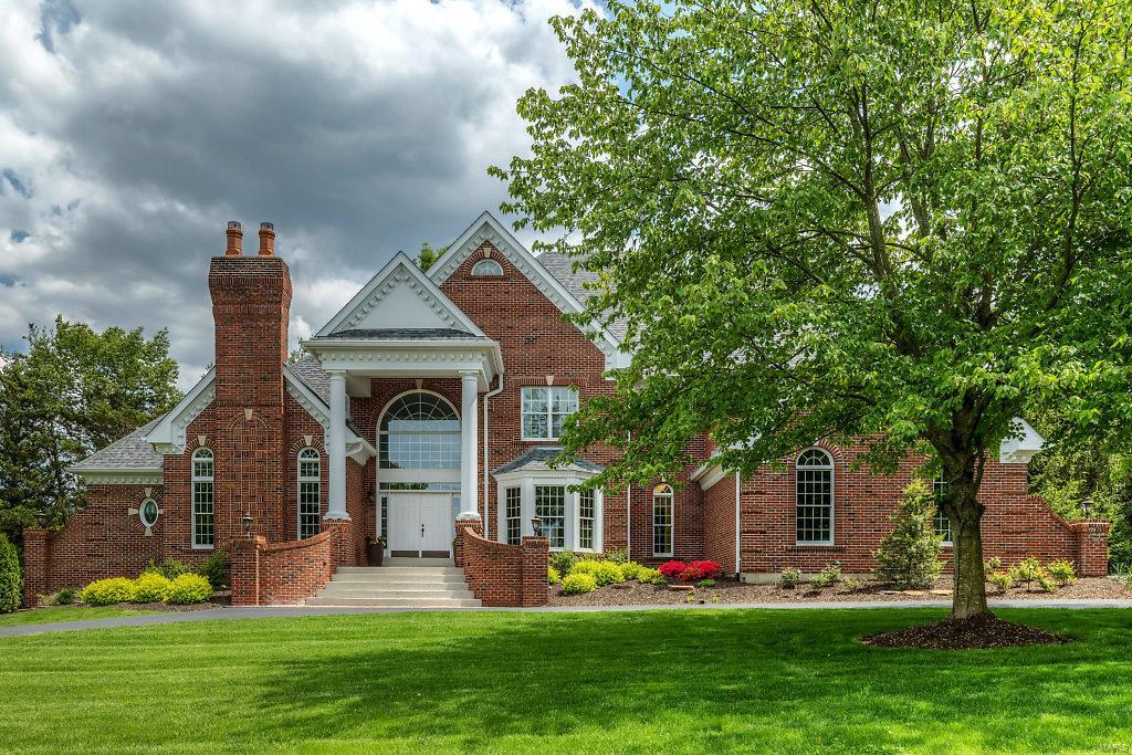 Beautifully designed 1.5-sty Estate home from award-winning builder Deshetler Homes! Impressive 2-sty marble foyer leads to library-paneled study with bookcases & brick fireplace, elegant dining room & stunning great room with wet bar & marble fireplace flanked by palladian windows. Chef’s kitchen with 42” glazed cabinetry, granite countertops, commercial grade appliances & butler’s pantry adjoins breakfast room with convenient planning center & vaulted hearth room with skylights & stone fireplace. Coffered master bedroom suite with wide bay window, sitting area & lavish bath with shower spa offers an appealing retreat. Front & rear staircases access 3 additional bedrooms, 1 with ensuite bath & 2 with Jack n’ Jill bath, plus bonus loft room. Lower Level includes recreation room with fireplace & wet bar, game room, office & full bath. Situated on a 1-acre cul-de-sac lot with patio with grilling station & full-height stone fireplace & resort-style pool surrounded by landscaped gardens.