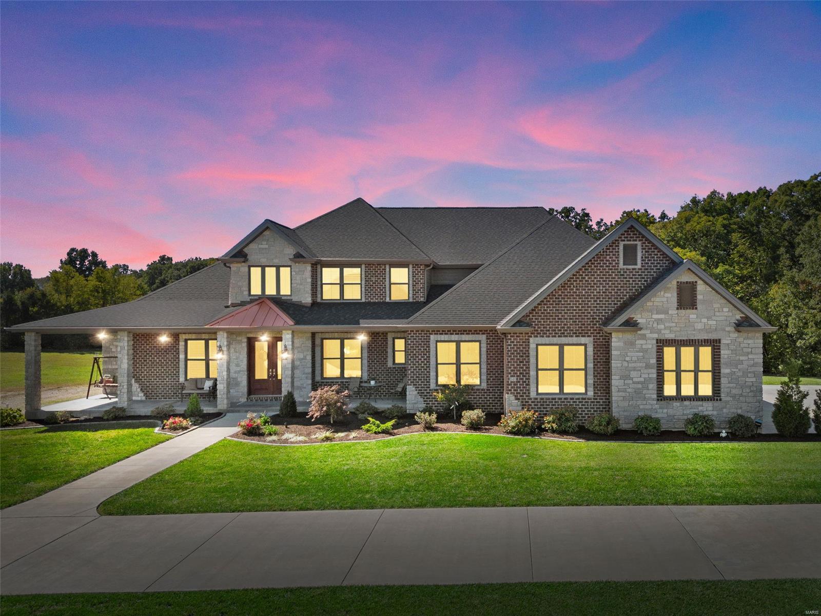 Luxury awaits in this custom 1.5 story on 3+ acres in Kohler Estates. Full brick/stone façade, copper accents and oversized side entry 3 car garage greet you. Upon entering you’ll be drawn to the soaring 2 story great room anchored by stone to ceiling gas fireplace and built-in bookshelves. A wall of windows overlooks the 40x15 heated saltwater pool, stamped patio and cabana. Exquisite kitchen boasts custom cabinets, quartzite, extended island w/built-in seating, appliance package and breakfast nook opening to hearth room w/2nd fireplace. First floor also features formal dining, office, mudroom w/hand-crafted cubbies, 2 full guest baths, pantry, laundry w/ample cabinetry and primary w/lavish spa bath and large walk-in closet. Hardwood staircase w/iron balusters leads to 2nd floor w/3 spacious bedrooms, 2 baths and loft. Finished walkout w/9ft ceilings adds wet bar, rec area, bedroom, full bath, and bonus room. Minutes from Lake St. Louis shopping, Busch Wildlife and Wine Country! Additional Rooms: Mud Room