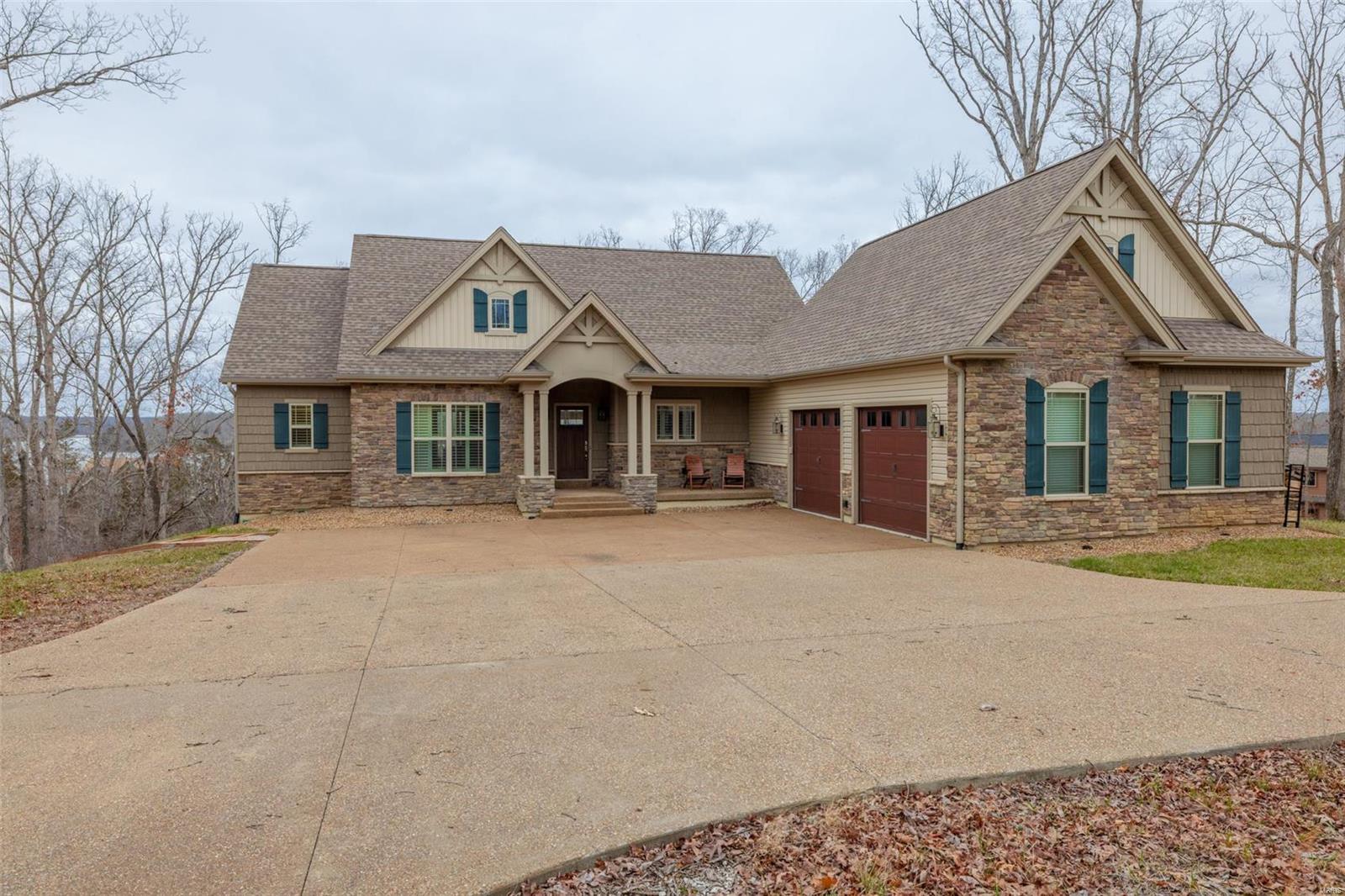 LAKE ALPINE!!! Your lake front dream home awaits. This custom built, 7 year old home boasts panoramic views of lake Alpine and access to lakeside dock. Home features 4 bedrooms 3.5 baths, great room with wood burning fireplace, wood covered vaulted ceilings, ML engineered hardwood floors, and a ML screened porch offering majestic views of 236 acre lake Alpine. The open floorplan offers a separate dining area, open kitchen features custom cabinetry, island counter/breakfast bar, solid surface counters, walk-in pantry and access to ML laundry, mudroom and oversized 2 car garage. ML MBR suite offers soaking tub and separate shower, walk-in closet and views of lake Alpine. Lower level walkout features 2 additional bedrooms and 2 baths, spacious living room/game room and plenty of additional storage. Additional Lower level covered maintenance free deck. Located minutes away from Charrette Commons and the Championship golf course. Some furniture available separately Additional Rooms: Mud Room, Sun Room