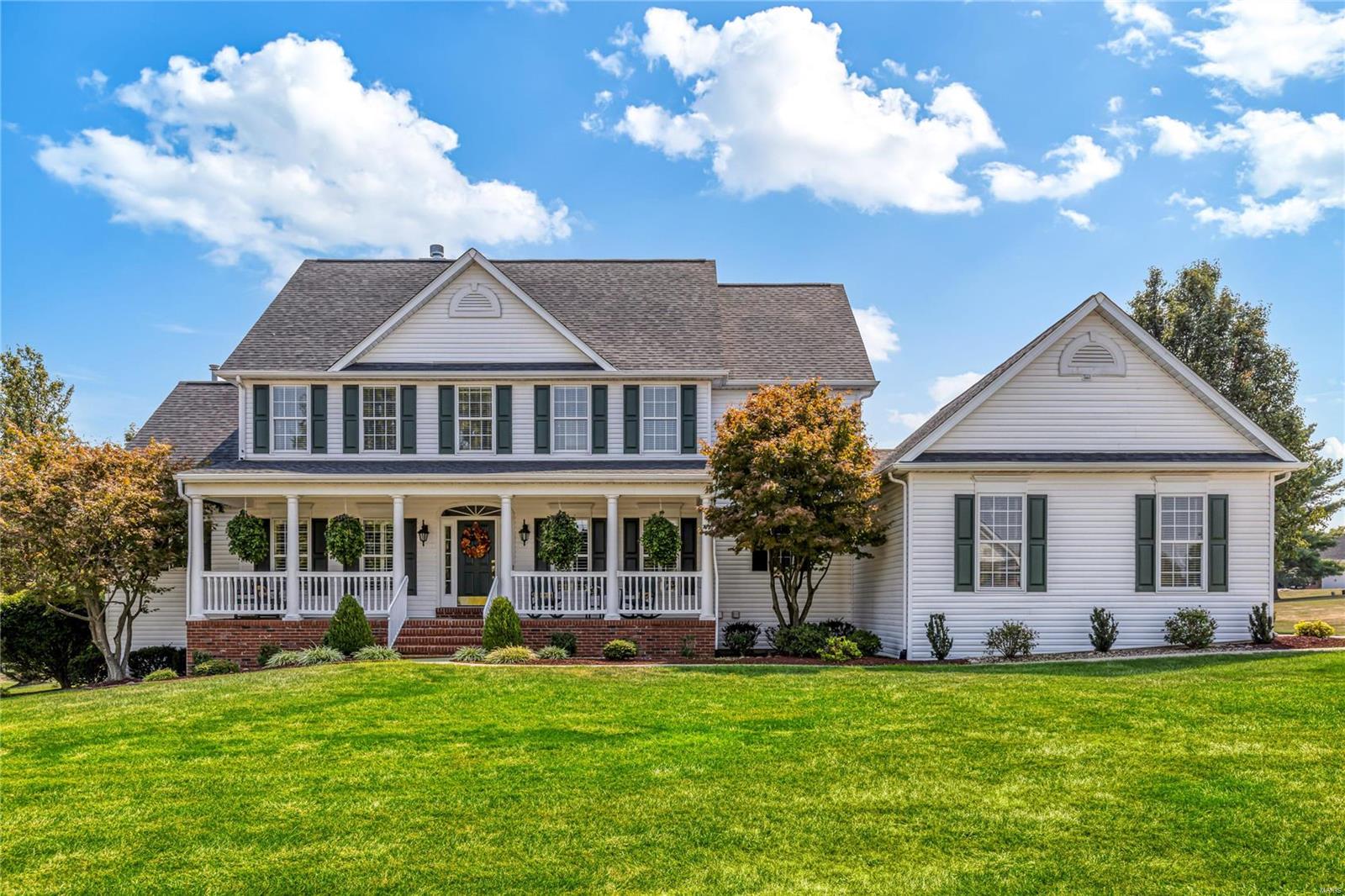Picture Perfect Southern Colonial in beautiful Camelot. This Whittaker-built 1.5 Sty features elaborate millwork, plantation shutters & oak hardwoods that extend throughout the main living area. Impressive marble foyer leads to private study, formal dining room & spectacular great room with marble fireplace flanked by built-in bookcases & dramatic 2-sty bay window that overlooks parklike backyard. Designer kitchen featuring 42” white cabinetry, granite countertops & stainless steel appliances adjoins light-filled breakfast room with sliding glass door that opens to terrace. Spacious primary bedroom suite with sitting room & luxury bath with jetted tub offers an appealing retreat. Broad oak staircase accesses 3 additional bedrooms, 1 with ensuite bath & 2 with Jack n’ Jill bath, & bonus loft room. Lower Level includes recreation room, game room with wet bar, workout room & full bath. Situated on a 1-ac cul-de-sac lot with pool & stamped concrete terrace surrounded by landscaped gardens.
