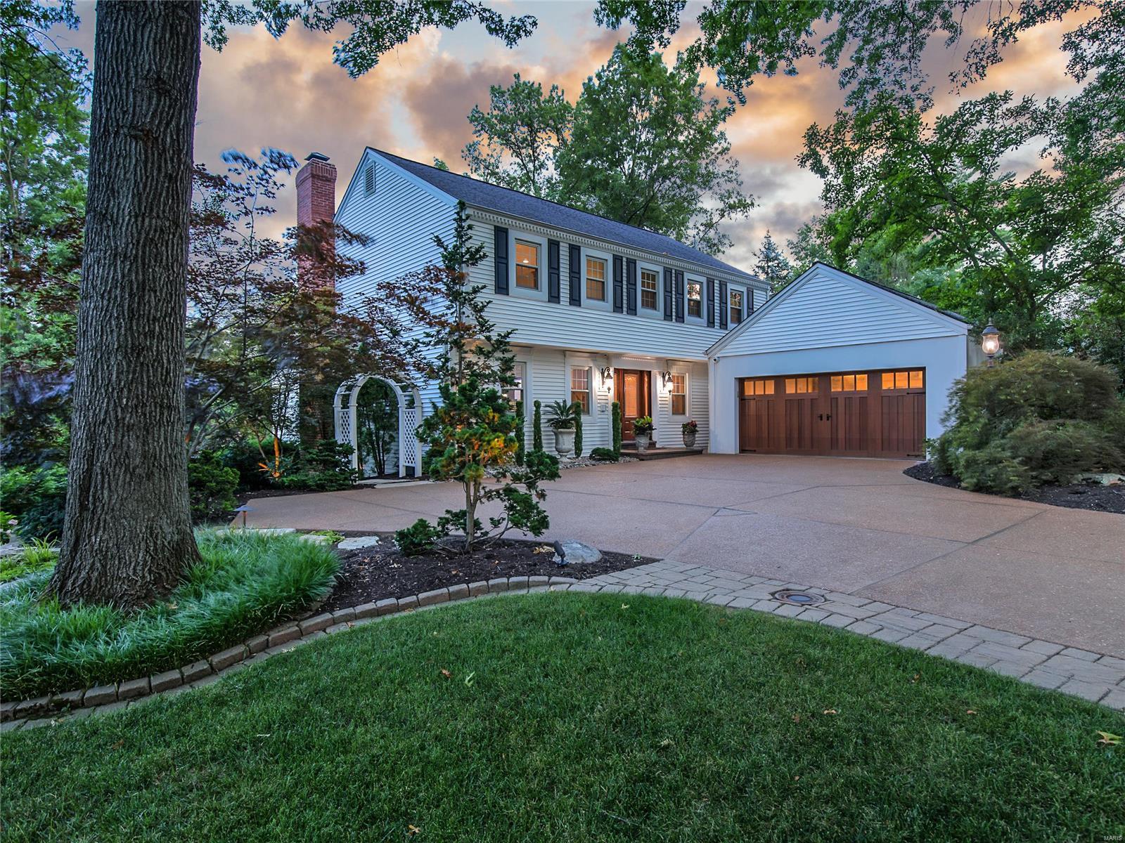 Welcome to this lovely, completely updated home nestled on a quiet Ladue lane. A center hall floorplan welcomes you offering a living room on the right & an office on the left. Beyond the office is a family room, adjacent you will find the heart of the home - kitchen, hearth room & dining area. The kitchen is breathtaking - quartz countertops, stainless appliances and 42 inch cabinets. Off the kitchen a beautiful deck overlooks the incredible custom pool. Upstairs you will find a sprawling primary suite including a spacious closet and updated bath. There are also 3 good size bedrooms with great closet space and a full bath. The lower level offers a recreation space, a half bath and an additional bonus space that could be a gym or office. The lower level walks out to the private backyard oasis. The pool and yard are unbelievable- you will feel like you are on vacation everyday! This is a SMART HOME with Control4 technology. A 2 car garage rounds out this extraordinary home.