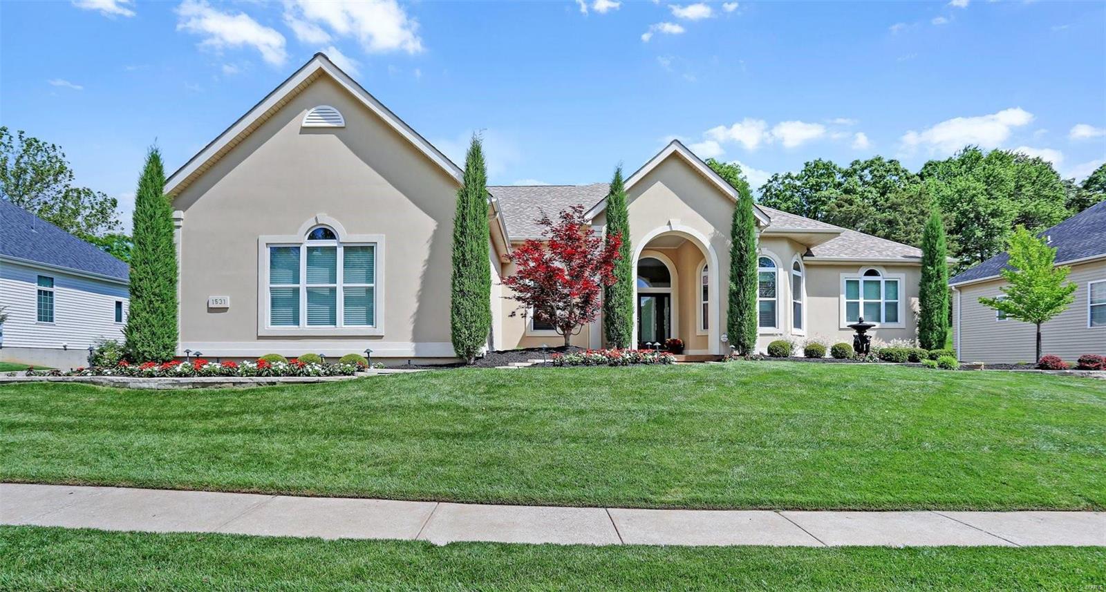 STUNNING, COMPLETELY REMODELED, professionally designed Atrium Ranch within desired subdivision of Garden Valley Farms in Wildwood! STL Magazine AWARD WINNING luxury bathroom. Boasting a private inground heated saltwater pool. 3-car garage side entry, 4 bedrooms & 3.5 baths w/3,927 sqft. SONOS controlled speaker system inside & out. A private oasis w/ 30’ tall trees lining the backyard overlooking majestic farmland. Rich, warm wood engineered flooring, 12’ ceilings, gas stone FP, & abundance of natural light. Wall of windows in great room overlook pool. Designer kitchen flaunts custom inset cabinetry, island, walk-in butlers pantry w/custom shelving. Custom closets throughout home. Primary features 2 custom closets. Bedroom w/ensuite full bath, dining room, hearth room, laundry room, office, & half bath complete the main level. Walk-out lower level expands living quarters w/2 bedrooms, full bath, large rec room w/wet bar, & storage space. Privacy galore!