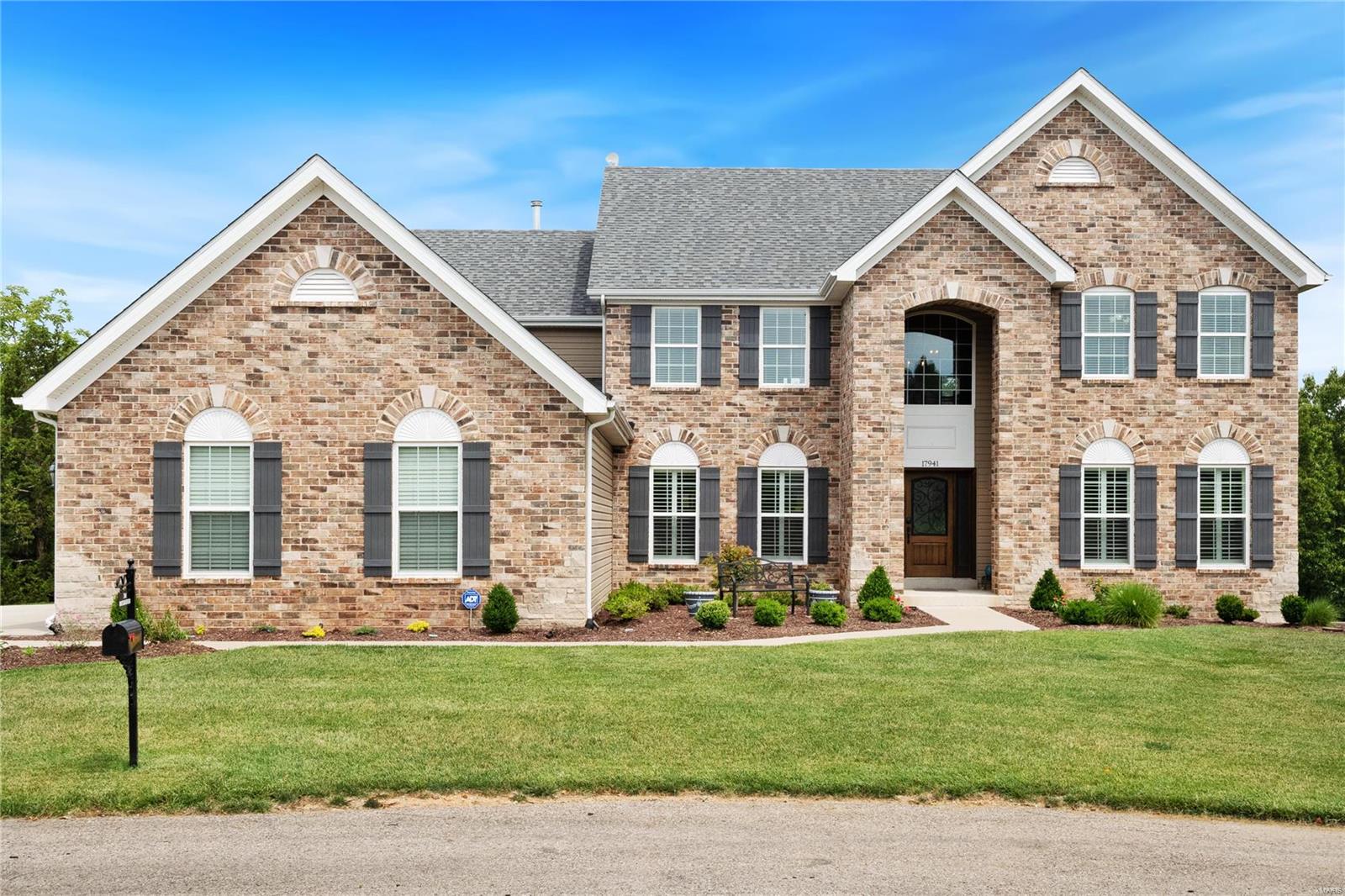 Absolutely beautiful 1.5 story that shows like a display, situated on a 2+ acre cul-de-sac lot, w/ beautiful panoramic views from the upper deck & plenty of space to add additional outdoor living.  As you enter you will find a gorgeous staircase w/ wrought iron spindles & study w/ built-in bookcases. A large dining rm opens to the 2 story great rm w/ a gas fireplace. Fabulous kitchen, custom cabinets, quartzite countertops, center island, upgraded appliances, a gas cooktop, beverage center & adjoins the breakfast rm & vaulted sunrm w/ access to the deck overlooking the beautiful yard. The master suite features a spacious bedrm & a lux bath w/ double sinks, soaking tub, walk-in shower & walk-in closet w/ custom organizers. 3 large bedrms, 2 full baths & a large bonus rm complete the UL. The walk-out LL, w/ rough-in plumbing, presents an opportunity to be finished to your custom specifications. Deck, covered patio, 3-car side entry garage & more. This impeccable home is sure to impress! Additional Rooms: Mud Room, Sun Room