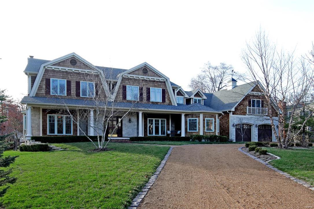 Exceptional fully customized Cape Cod in a lovely Norman Rockwell like neighborhood. This magnificent 5 bedroom/4.5 bath home provides every amenity imaginable. It boasts many features you would find in an old world mansion: a vestibule opens to a 14 x 12 entry with marble floors and stain glass doors, incredible moldings and wainscoting, chefs kitchen and hearth room, 2 butlers pantries, 2 staircases, upstairs family room and wet bar, and 7 fireplaces. Luxurious master suite. First floor guest suite, inviting rear deck 35 x 12; endless possibilities with lower level and oversized 2+ tandem garage. Walk able to Kirkwood's charming downtown.