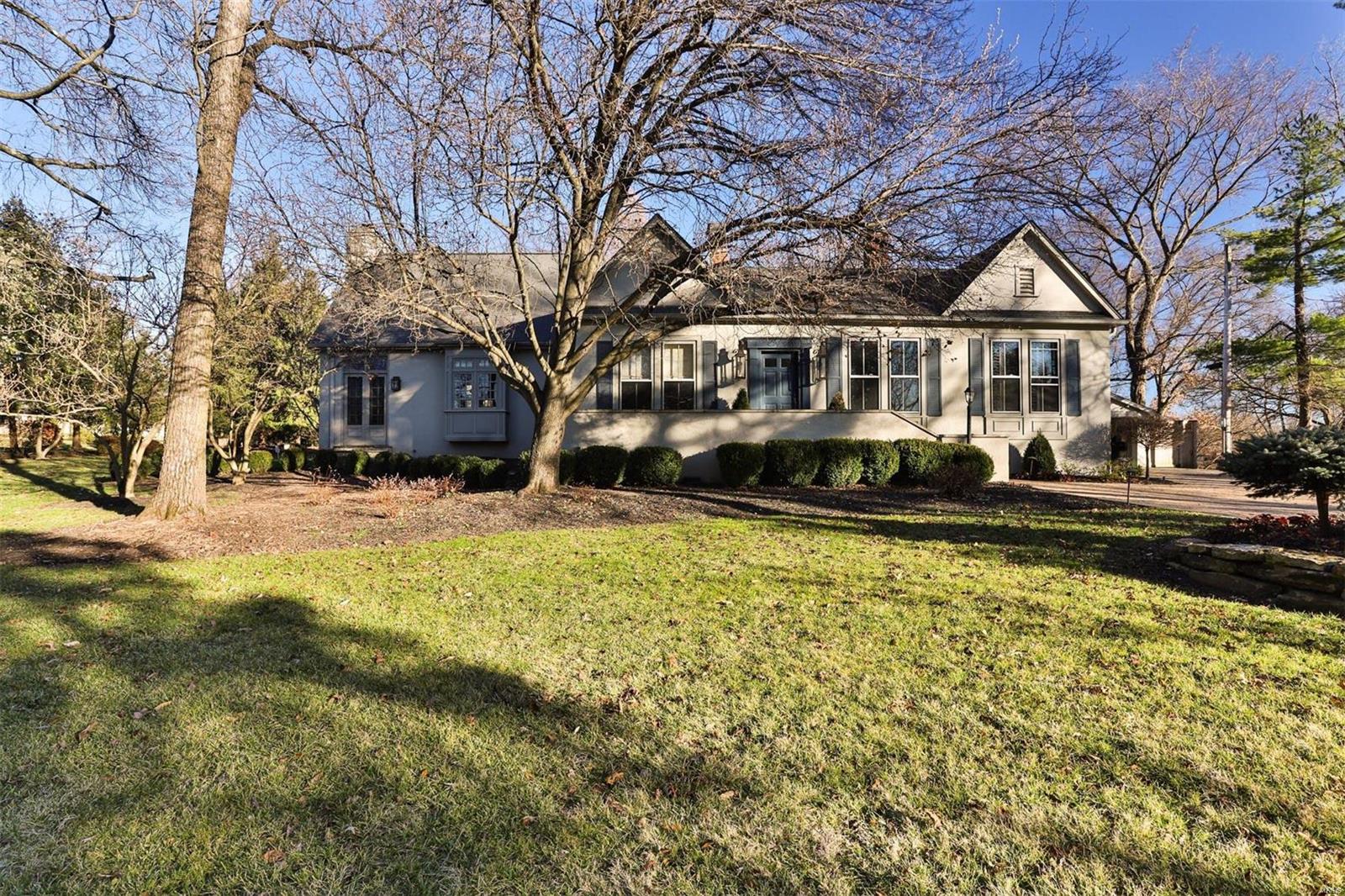 This beautiful Ladue home has been completely reimagined by Jacob Laws interior design.  This unique property, which sits on acre, is being offered fully furnished.  Upon entry you are greeted by gorgeously redesigned living and dining areas along with office which could be converted to third bedroom.  The impressive kitchen features large eat-in island, wood burning fireplace, breakfast room, along with the finest appliances. The expansive butler’s pantry includes Carrara counters and leaded glass displays. A vaulted great room with stone fireplace and separate bar is perfect for entertaining. The master suite provides gracious dressing room, walk-in closets and a travertine bathroom. The main level also includes additional bedroom/full bath and main floor laundry. The lower level boasts a wine cellar and tasting room along with additional full bath.  The exterior includes exquisite gardens, spacious stone patios and an in-ground pool. A rare offering, conveniently located in Ladue. Additional Rooms: Wine Cellar
