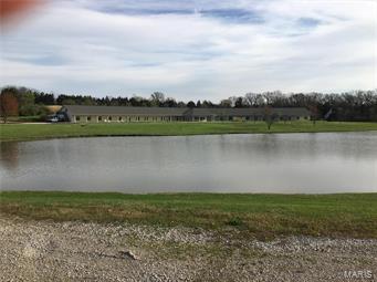 For Comp purposes only. Formerly known as Sojourn, this retreat center has more to it than first meets the eye. Starting off two Tax I.Ds make up this 55.46 +/- acre parcel with a private lake & road frontage on both State Route 30 & Dittmer Ridge Rd. The first building you see is the 28,000 sq ft retreat house which has 27 guest rooms, each with a full bath, 3 conference rooms, 3 kitchenettes, a commercial kitchen, 2 offices, staff sleeping quarters plus an expandable unfinished attic space. Next is the main private residence which is 7,000 +/- sq ft (including the unfinished space above the garage), 4 bedrooms, 6 full baths, 2 kitchens, 45’x45’ 3 car garage w/workshop & solar panels for energy efficiency. Then there is a 8,400 sq ft 2 story utility building with an unfinished interior which space could be doubled with the addition of a second floor. Rounding things out are 2 other homes at 900 & 1,200 +/- sq ft which could produce rental income.