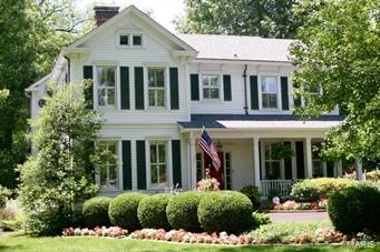 Set in the heart of Kirkwood, this Historic Landmark House is ready for its next family. Originally built in 1870 with additions in 1930 and 1996, the house has been lovingly updated and maintained. Complete with three staircases, 4 bedrooms, 5.5 bathrooms, formal and informal living and dining spaces, library, a finished lower level with additional bedroom/full bath, and 3.5 car garage with shelving and plenty of storage. The house boasts architectural details throughout complete with a custom cherry cabinet kitchen with granite counter tops, 4x8 center island, gourmet appliances, and breakfast room.  The master bedroom and and sitting room leads to the natural light master bath with heated floor and Travertine stone. This gem is perfect for entertaining while providing porches and outdoor spaces to relax and unwind.