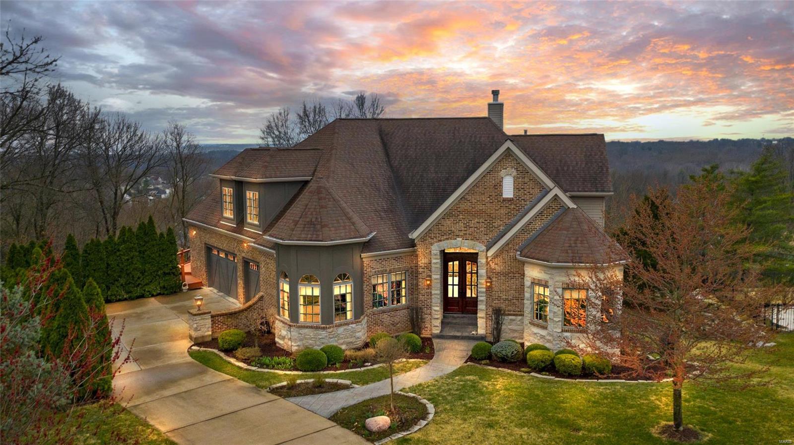 Wow! Look at that view!! Gorgeous custom built home with 5 beds/4 full and 1 half baths. Beautiful wood floors and crown molding throughout the home. Cozy home office perfect for all your zoom calls. Enjoy all your family dinners in the large DR with accent lighting. Great Room has floor to ceiling windows with a spectacular view. Kitchen features SS appliances, DBL oven, granite counters, breakfast bar, custom built-ins, wine cooler and cozy breakfast room. Hearth room has stone surround FP and access to your double tiered deck. Master en-suite is truly amazing with walk in closet, and luxurious bath with his and her sinks, jacuzzi tub and sep shower. Upstairs you'll find two beds with shared Jack n Jill bath plus 4th bed. The kids can sprawl out in LL  rec room with gas fireplace and more amazing views. 5th bed and another full bath. In any season home has spectacular views! July 4th brings a wonderful firework display across the skyline. Furnace 1 year NEW! AC 4 Years! Rapid HWH.
