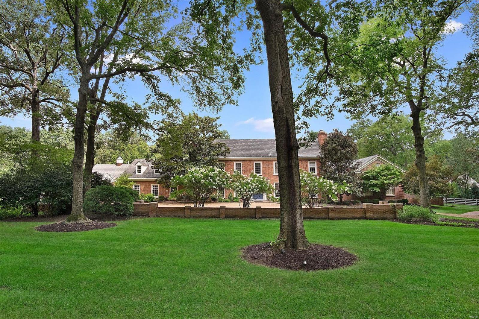 Exceptional opportunity to live near Ladue's historic bridle trails awaits you in this prime 3 acre estate with its beautiful pool, lovely outdoor patio area & tennis court in your private back yard.  This stately home has 7359 sq ft on the first two floors, not counting the enormous lower level which was completely renovated in 2016 & features a family room with fireplace, full kitchen, billiards room plus so much more  Exquisite moldings & mill work thru-out the first floor. New chef’s kitchen in 2019. Elegant living & dining rooms, both with fireplaces.  Cozy paneled study with wet bar, family room with fireplace, & light-filled sun room, complete the main floor. Stunning first floor master has large spa-like bath & huge walk-in closet. Second floor offers 4 bedrooms & 3 full baths plus a large bonus room ideal for many uses. Third floor provides an abundance of storage. 6 car garage has separate office above plus an additional 2 car spaces below. Truly a magnificent offering! Additional Rooms: Sun Room, Wine Cellar