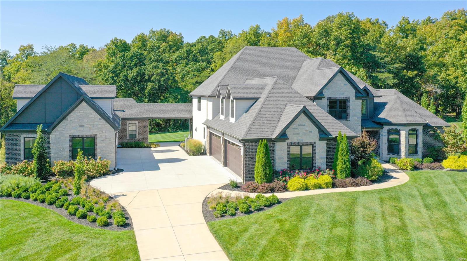 Welcome to the epitome of luxury living! This exceptional 5-bedroom, 6-bathroom home on over 6 acres offers a lifestyle of unparalleled convenience and sophistication. Step inside and experience the future of home automation. Every aspect of this residence has been thoughtfully designed for your comfort and ease and can be controlled from your phone. The motorized shades by Lutron allow you to effortlessly control natural light. The state-of-the-art lighting control system adds an extra layer of elegance. A comprehensive network of 13 security cameras providing 24/7 surveillance. The dedicated media room promises cinematic experiences like no other and the list goes on. 4-Car attached garage and another fully heated 4-car garage with bonus room above! This home comes furnished, making your move-in process a breeze. Don't miss this rare opportunity to own a fully automated, luxuriously appointed home that offers the perfect blend of comfort, security, and entertainment. Additional Rooms: Mud Room