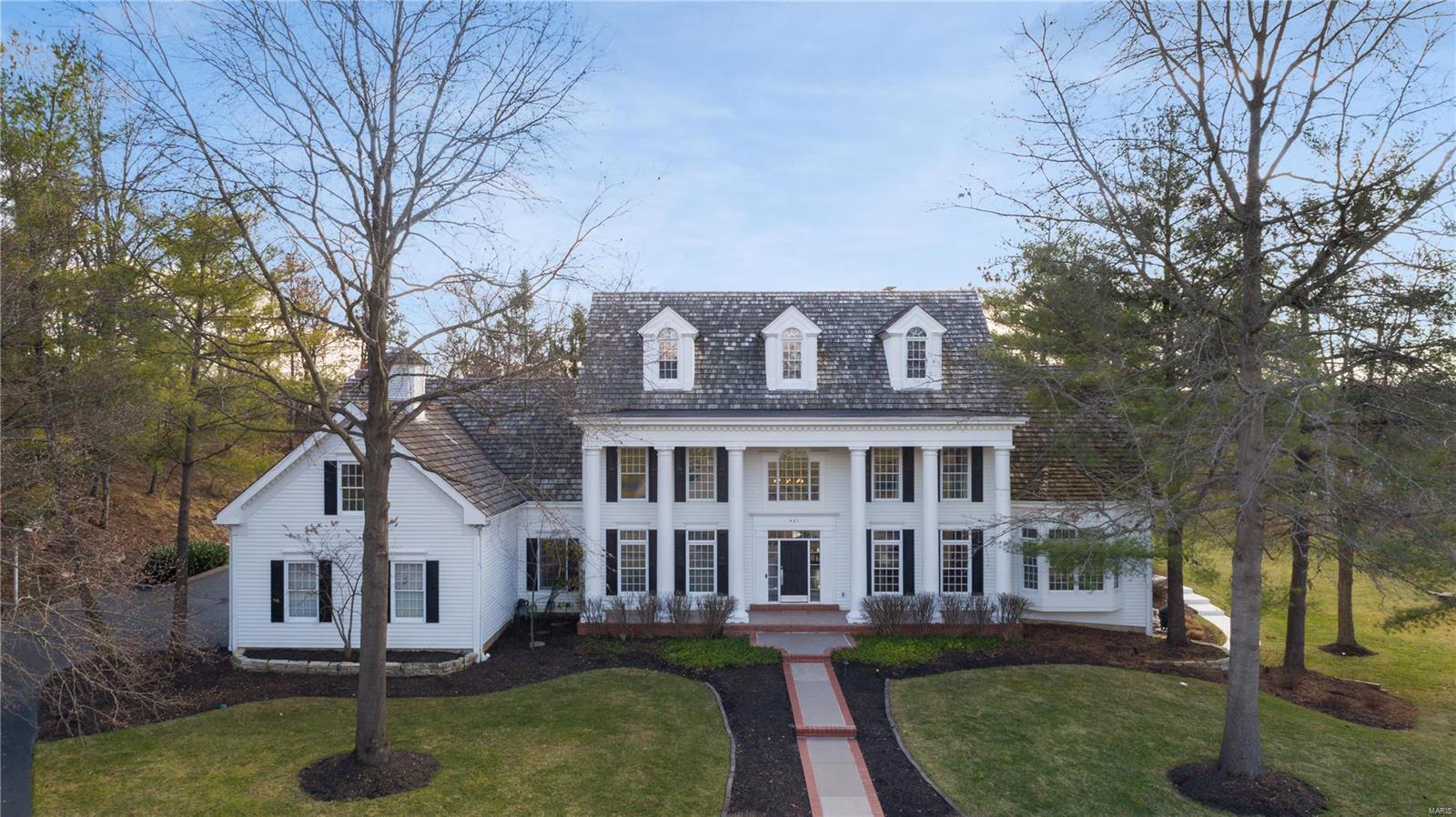 Prestigious 1.5 story perfectly sited on a private acre in Creve Coeur! Tastefully updated with refined finishes, the Johnson-built quality radiates throughout all 3 levels. Grand 2 story foyer, balanced with an intricately paneled office and stylish dining room, opens to great room filled with natural light. Delightful kitchen anchors the east wing with center island, coffee bar, and step in pantry. Adjoining breakfast room and vaulted hearth add gathering space, and enhanced laundry room is just awesome. West wing contains the stunning main bedroom suite with luxurious bath that will absolutely pamper you. Second bedroom suite and 2 more bedrooms sharing the 3rd bath are upstairs, all spacious and with walk-in closets. Double rec areas in walk out lower level allow for easy entertaining, plus 500 bottle wine cellar, cedar closet, 2 more BRs and bath. Gorgeous pool highlights private backyard surrounded by lush landscaping. By appt only, see Features List for more impressive details! Additional Rooms: Wine Cellar COOL: 14 SEER+