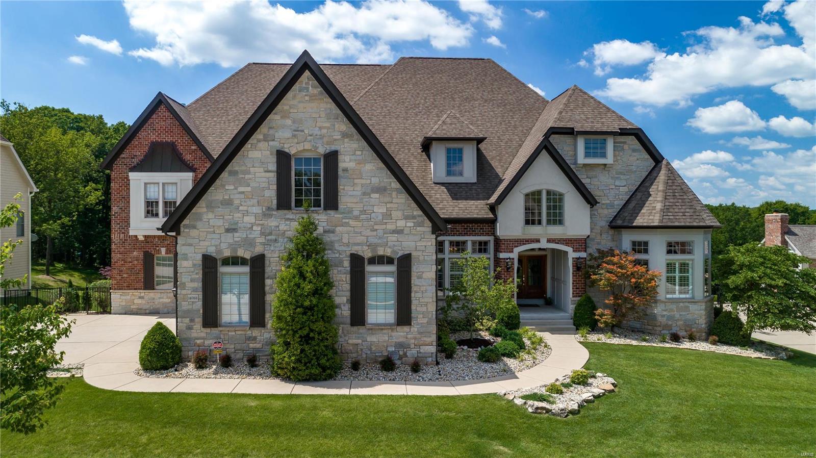 This custom 1.5 story is truly exceptional! Situated on a quiet cul-de-sac & a gorgeous private lot backing to trees w/ an inground pool & exquisite screened-in porch perfect for entertaining & enjoying the fresh air w/ vaulted ceilings & built-in heaters. 2 story entry w/ charming staircase opens to a private study w/ built-ins & a spacious dining rm w/ a framed tray ceiling & wood floors. The 2 story great rm w/ floor to ceiling custom windows & wet bar opens to the completely updated gourmet kitchen w/ custom cabinetry & crown molding, granite countertops, gas cooktop & new range, & breakfast bar - adjoins the breakfast rm & large hearth rm w/ stone fireplace & custom built-ins. ML master w/ sitting rm & fireplace & updated lux bath. 2nd bedrm/in-law suite also on the ML. 3 addtl bedrms, 2 full baths, & loft/rec rm on the UL. This spectacular home also features ML laundry, built-in grill center, covered patio, extensive landscaping including waterfalls & fountains & more! Additional Rooms: Mud Room
