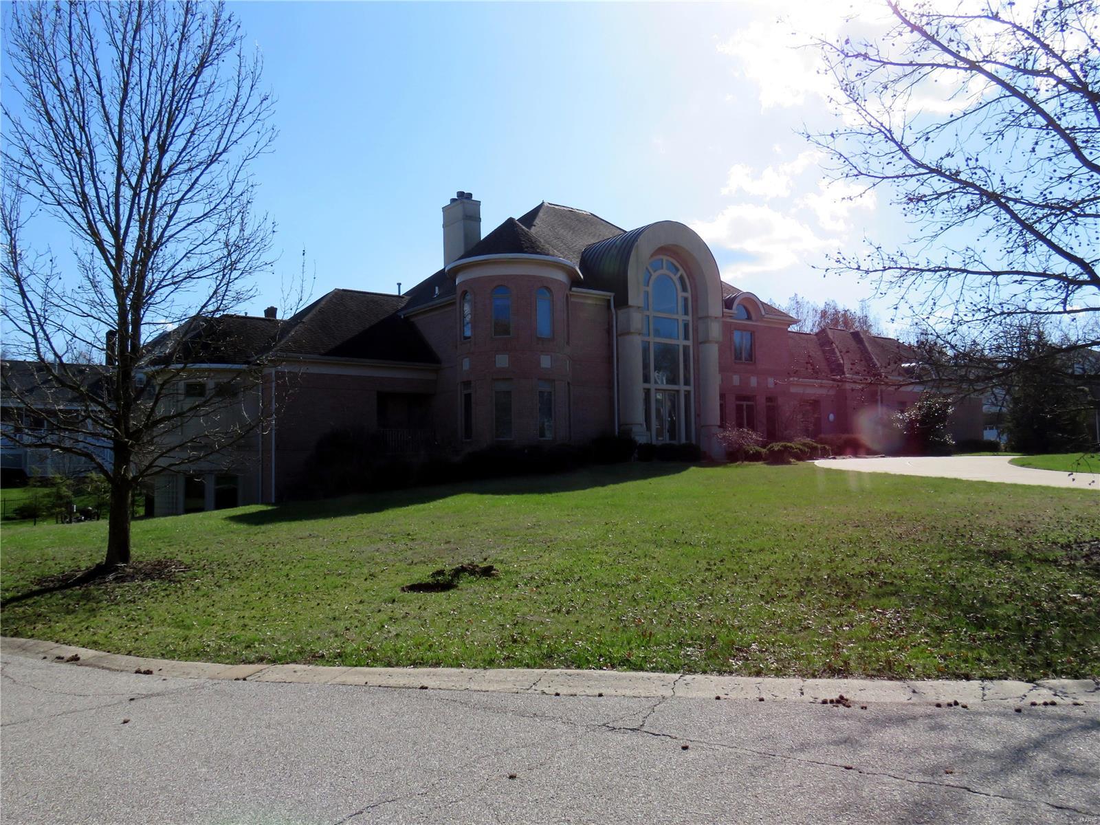 YOUR DREAM HOME IS HERE*LOCATED IN A SMALL GATED SUBDIVISION NEAR EVERYTHING*1 ACRE LOT*A WALL OF WINDOWS GREETS YOU AS YOU ENTER*OVER 10,000 SQ FT OF LIVING SPACE*LUXURY MASTER BEDROOM SUITE WITH FIREPLACE & HIS/HERS WALK IN CLOSETS*LARGE KITCHEN WITH ADJOINING WET BAR FOR ALL YOUR ENTERTAINING WANTS*ELEVATOR TO ALL 3 FLOORS*THEATER ROOM IN BEAUTIFULLY FINISHED LOWER LEVEL*CHECK OUT THE LOWER LEVEL SAUNA, HOT TUB ROOM & 2 LOCKER ROOMS*UPGRADED LIGHTING THROUGHOUT*CENTRAL VACUUM*6 ZONES OF HVAC*WAIT TO YOU CHECK OUT THE LIGHTING & AUDIO SYSTEMS WITH SURROUND SOUND THROUGHOUT*GREAT ROOM IS A STUNNER WITH 1/2 MOON FIREPLACE & A WALL OF WINDOWS*WALK OUT LOWER LEVEL TO THE PATIO, IN GROUND POOL WITH LIGHTED FOUNTAIN*THIS IS A ONE OF A KIND CUSTOM BUILT HOME THAT WILL NOT DISAPPOINT*

***Deadline for highest and best from all buyers is 1:00 PM Wednesday (5/23)*** SpecialListingConditions: Foreclosure