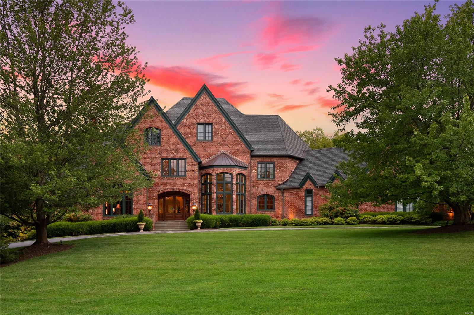 Truly exceptional in every way, this custom built home was designed with a timeless style and floor plan delivering wonderful square footage on all levels without losing a sense of comfort and functionality. Welcomed at the front entry with views of a cascading waterfall in the rear spanning multiple stories, a backdrop unmatched by any other estate in contention. Main floor living perfectly designed for everyday active living & entertaining with a primary suite and formal living, dining, hearth, mud and laundry rooms plus a bar and multiple butler pantries for the host seeking seamless entertaining. A main floor terrace with glass walls spanning the rear of the home with expansive views of the outdoor amenities. A catwalk on the upper adjoining three bedroom suites, a study room and an enormous vaulted unfinished attic space for the buyer with lofty dreams. An unmatched lower level that has been finished to match the high quality details of the main floor and includes every amenity: Additional Rooms: Wine Cellar