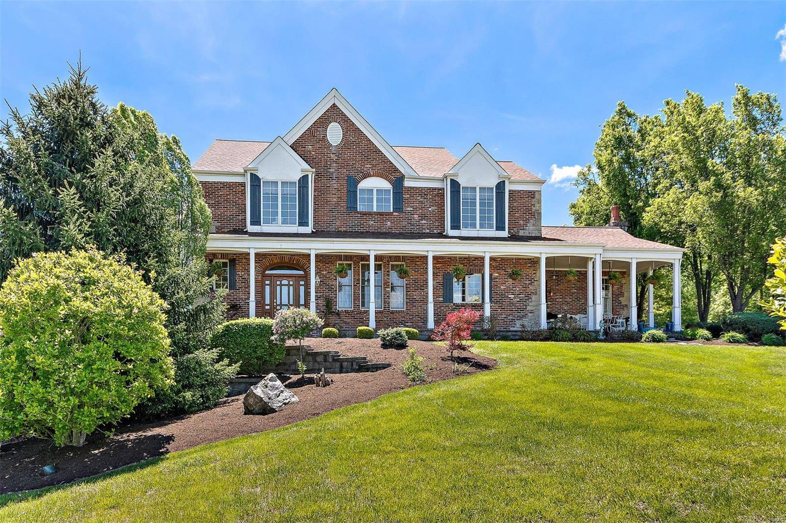 Welcome to your own personal oasis! This magnificent home is nestled on 3 beautifully landscaped acres, offering a serene retreat. With 5 bedrooms, 4 full baths, and 2 half baths, there's ample space to fulfill your personal needs. The large eat-in kitchen with a hearth room is perfect for gathering and creating lasting memories. The living room and dining room provide elegant spaces for relaxation and entertainment. The lower level features a recreational space that walks out to an amazing in-ground pool, surrounded by ample entertaining space. Enjoy the crystal-clear waters of the pool on hot summer days. Outside, you'll find a beautiful pond, an outdoor pizza kitchen, and a separate fireplace, adding to the charm and functionality of the property. The meticulously landscaped gardens and flower beds offer tranquility and beauty. This property embodies the essence of outdoor living at its finest, and seamlessly combines luxury, comfort, and outdoor entertainment.