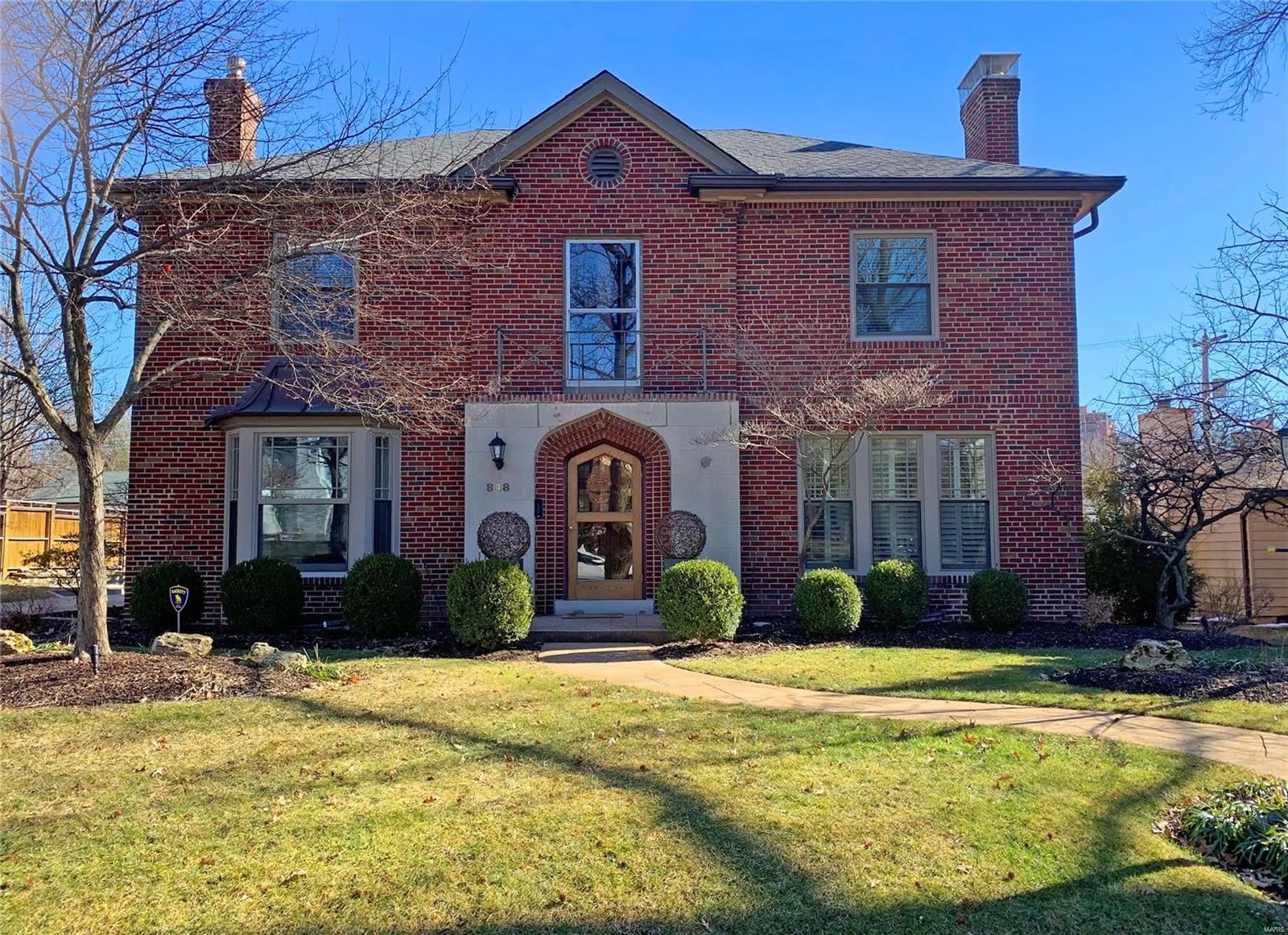 This stunning, impeccable home in popular Davis Place will knock your socks off from the moment you step inside! Grand foyer offers views to the back of the property. Beautiful curved staircase. Top of the line, award-winning kitchen & powder room were both featured in St. Louis Homes & Lifestyle magazine in 2018/2019 respectively. Gorgeous, graciously sized formal living & dining rooms, spacious & sun-filled family room off the kitchen opens to a large, custom patio - perfect for entertaining. Private & enormous master suite with attached home office/nursery, luxury bath & abundant closet space plus three more large bedrooms, one of them with en-suite bath, an additional hall bath & second laundry complete the second floor. The lower level is finished with a wonderful recreation room, another renovated full bath, and plenty of storage space. Beautiful landscaping, two-car attached - at level garage, walking distance to schools & parks. Everyone who sees this home is going to LOVE it!