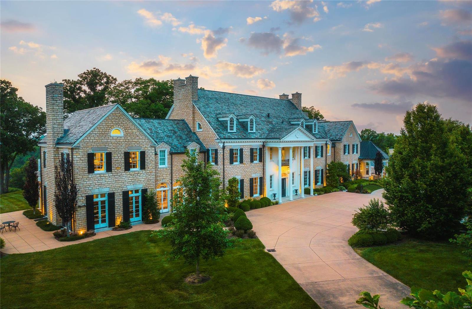 12 Danforth Rd is one of the Midwest's most stunning estates, with breathtaking views of The Great River Road and Mississippi River.  Originally built in 1927, the home has had thoughtful updates made over time, with major renovations completed in 2013, including an underground tunnel connecting the main residence to the guest house and 11-car garage. The 7 bedrooms each offer private suite features. Located approximately 35 minutes from Lambert International, and 15 minutes from a private airstrip, the estate offers convenient transportation options. The charming towns of Alton and nearby Grafton provide marina access to major waterways. The residence, its systems and grounds have been meticulously cared for. Known as the "Olin Mansion," this exquisite property has approximately 15,000 sq.ft. of space in the main residence, and is situated on 32 acres of land in the Fairmont subdivision, a private development. We invite you to reach out to learn more about this remarkable estate.