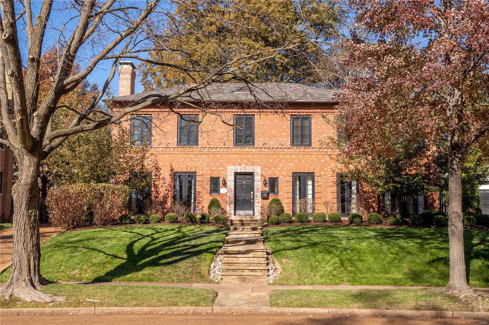 Est. 1924. Beautifully updated and impeccably maintained home in University Hills overlooks Flynn Park. Elegant, high-end updates maintain the stateliness of this historic home. Beautiful hardwood floors, crown molding, built-in cabinetry and bookshelves. Updated kitchen with plenty of cabinetry and granite counter space opens to a palatial family room. Separate formal living and dining rooms with views of the park through new (2016) fixed French doors. Charming den with floor to ceiling bookshelves and new (2016) French door opens to front porch. First floor laundry/mud room. Main floor bedroom is also great as office. Second floor primary suite consists of an updated bath with double sinks, claw foot tub and separate shower and a massive walk-in closet. Three additional beds and hall bath on second floor. Newer windows (2016 & 2019), tuckpointed 2017, three HVAC zones, smart thermostats, landscape lighting, drain tile and sump in basement, new patio, new garage floor, fully fenced.