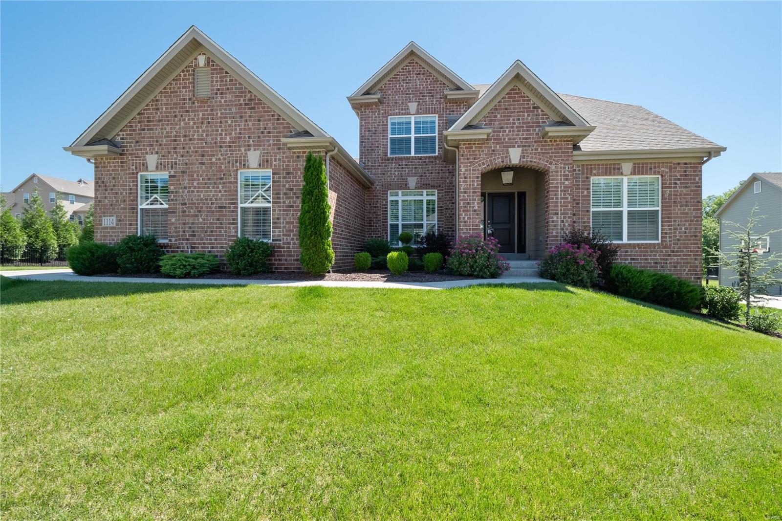 UPDATED & STUNNING 1.5 STORY located in Wilmas Farm, minutes from Chesterfield Valley! New deck, updated kitchen & Mstr bath, new carpet & lighting w/ much more! Brick front w/Hardie board siding sitting on a lg level yard & ready for your future pool and patio! 3 car side entry garage, sprinkler system, vaulted ceilings in great rm & kitchen, gas fireplace, Hunter Douglas wood shutters throughout, SS GE kitchen app w/ built in double oven, gas cooktop w/hood, 42" tall kitchen wall cabinets, open spindled stairway w/iron balusters, adult height vanities in MB & powder rm, ML laundry room, Dual Zone HVAC. Mstr Bed on ML w/double door entry, his & her walk-in closets, completely remodeled mstr bath w/ dual sinks, large walk-in shower. UL has 2 bedrooms that share J&J bath, 3rd has full bath, all 3 w/ walk-in closets! LL is ready for your personal design w/a 3/4" rough in bath. Quiet street, very min traffic. Playground and soccer field close by. Easy access to HWY 40/61 for any commute!