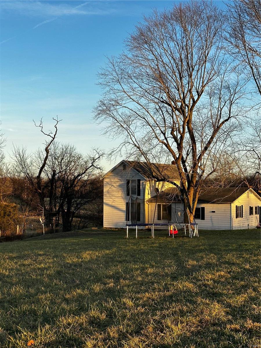 108 m/l Beautiful Acres with Farm house and large barn. Close to town with privacy and water frontage! This farm is mostly bottom ground along the year round Wolf Creek with upper pastures and some wooded portions. Amazing property to farm, raise livestock or use for recreational purposes. Home has had numerous updates and sits overlooking the farm. Original 1900's barn is in great shape and could easily be converted into a horse barn or shop! Not often do farms this close to town come up for sale!